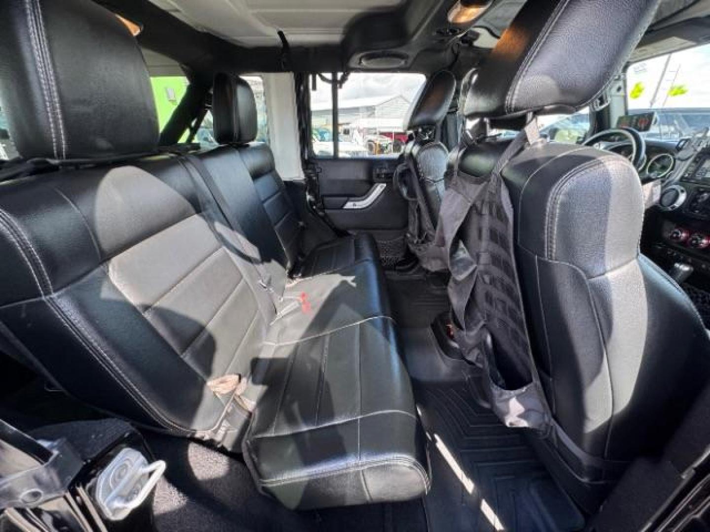 2012 Black /Black Jeep Wrangler Unlimited Rubicon (1C4HJWFG5CL) with an 3.6L V-6 DOHC engine, Automatic transmission, located at 1865 East Red Hills Pkwy, St. George, 84770, (435) 628-0023, 37.120850, -113.543640 - Completely decked out 2012 Jeep Wrangler Unlimited Rubicon. This awesome overlander has $20k in aftermarket features. 4x4, 3.6L engine. Excellent condition. Roof tent, Lift and tires, Front and rear bumper, hood jack, Stepsides, leather, engine tuner, rear storage racks and MORE. Come check it - Photo#22