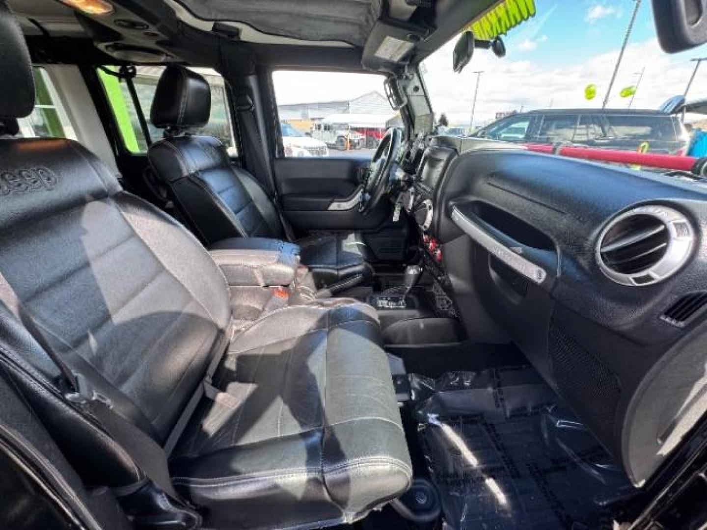 2012 Black /Black Jeep Wrangler Unlimited Rubicon (1C4HJWFG5CL) with an 3.6L V-6 DOHC engine, Automatic transmission, located at 1865 East Red Hills Pkwy, St. George, 84770, (435) 628-0023, 37.120850, -113.543640 - Completely decked out 2012 Jeep Wrangler Unlimited Rubicon. This awesome overlander has $20k in aftermarket features. 4x4, 3.6L engine. Excellent condition. Roof tent, Lift and tires, Front and rear bumper, hood jack, Stepsides, leather, engine tuner, rear storage racks and MORE. Come check it - Photo#23