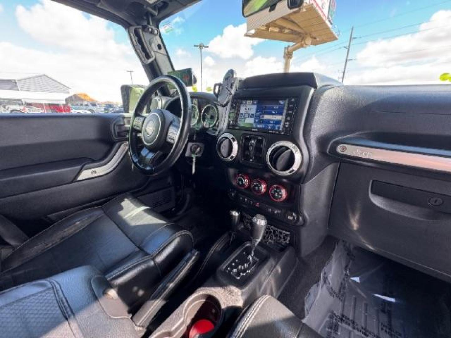 2012 Black /Black Jeep Wrangler Unlimited Rubicon (1C4HJWFG5CL) with an 3.6L V-6 DOHC engine, Automatic transmission, located at 1865 East Red Hills Pkwy, St. George, 84770, (435) 628-0023, 37.120850, -113.543640 - Completely decked out 2012 Jeep Wrangler Unlimited Rubicon. This awesome overlander has $20k in aftermarket features. 4x4, 3.6L engine. Excellent condition. Roof tent, Lift and tires, Front and rear bumper, hood jack, Stepsides, leather, engine tuner, rear storage racks and MORE. Come check it - Photo#24