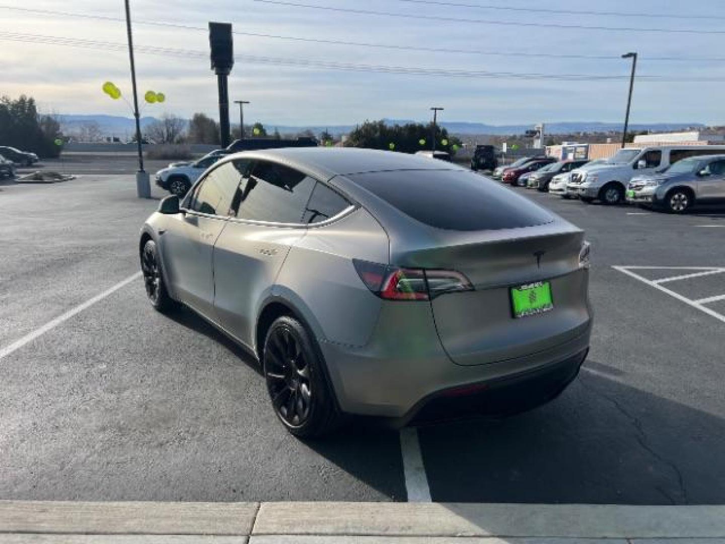 2021 White /White/Black Tesla Model Y Long Range Dual Motor All-Wheel Drive (5YJYGDEE5MF) with an ELECTRIC engine, Electric transmission, located at 1865 East Red Hills Pkwy, St. George, 84770, (435) 628-0023, 37.120850, -113.543640 - Excellent Tesla Model Y Long Range All Wheel Drive. With Full Self Drive paid for ($8k add on) Which is no longer available to buy. All our Teslas come with charging kit. Color changing wrap is a little rough but will still turn heads. Battery is healthy. Gets 275 on full charge. Clean title, no a - Photo#6