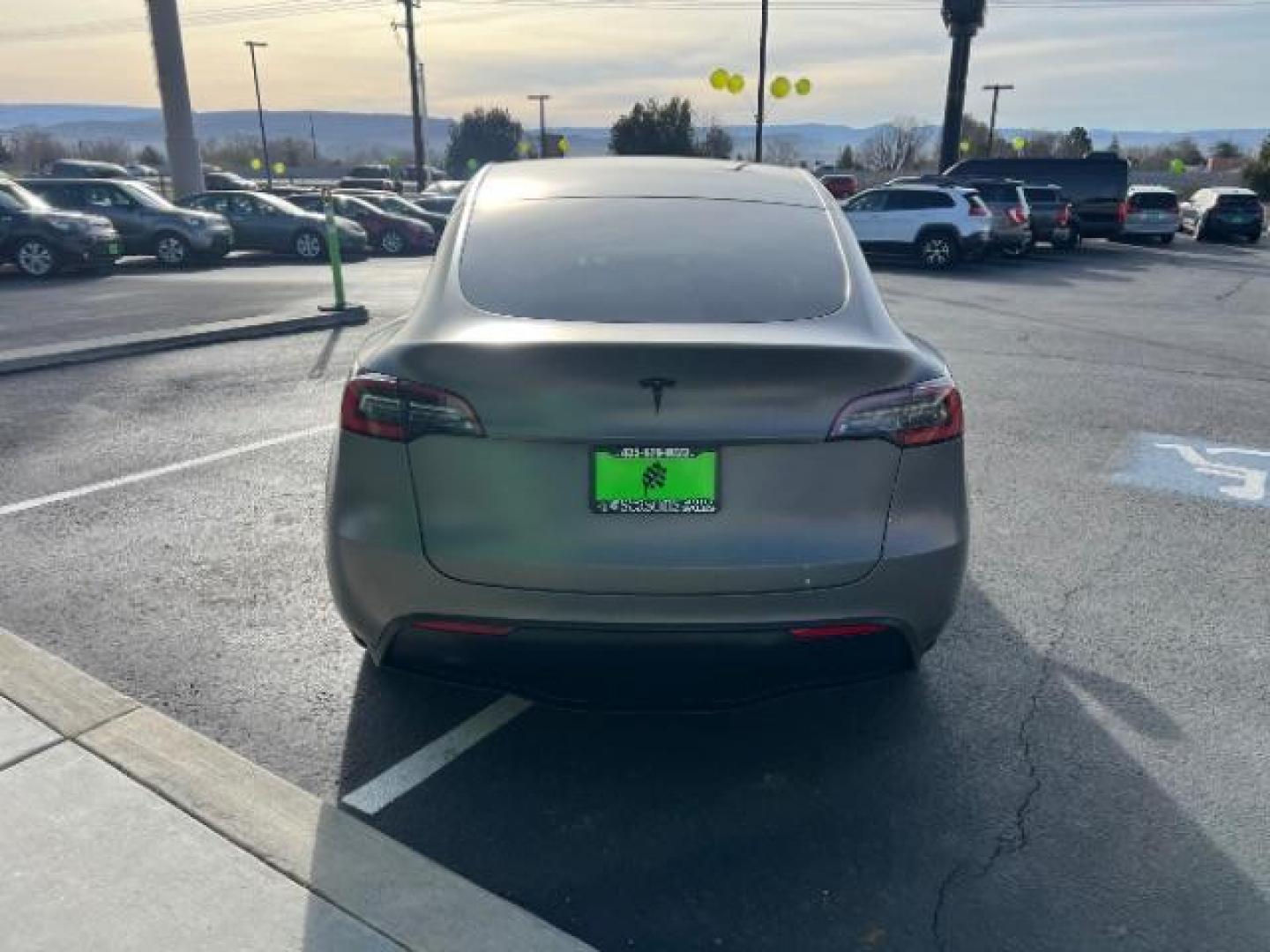 2021 White /White/Black Tesla Model Y Long Range Dual Motor All-Wheel Drive (5YJYGDEE5MF) with an ELECTRIC engine, Electric transmission, located at 1865 East Red Hills Pkwy, St. George, 84770, (435) 628-0023, 37.120850, -113.543640 - Excellent Tesla Model Y Long Range All Wheel Drive. With Full Self Drive paid for ($8k add on) Which is no longer available to buy. All our Teslas come with charging kit. Color changing wrap is a little rough but will still turn heads. Battery is healthy. Gets 275 on full charge. Clean title, no a - Photo#7