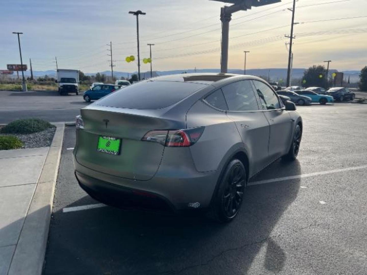 2021 White /White/Black Tesla Model Y Long Range Dual Motor All-Wheel Drive (5YJYGDEE5MF) with an ELECTRIC engine, Electric transmission, located at 1865 East Red Hills Pkwy, St. George, 84770, (435) 628-0023, 37.120850, -113.543640 - Excellent Tesla Model Y Long Range All Wheel Drive. With Full Self Drive paid for ($8k add on) Which is no longer available to buy. All our Teslas come with charging kit. Color changing wrap is a little rough but will still turn heads. Battery is healthy. Gets 275 on full charge. Clean title, no a - Photo#8