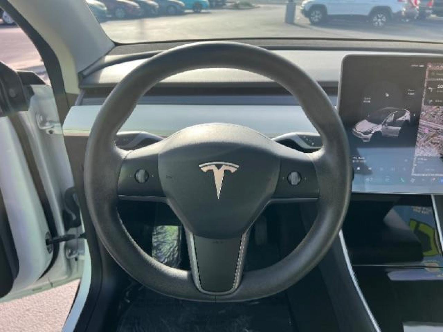 2021 White /White/Black Tesla Model Y Long Range Dual Motor All-Wheel Drive (5YJYGDEE5MF) with an ELECTRIC engine, Electric transmission, located at 1865 East Red Hills Pkwy, St. George, 84770, (435) 628-0023, 37.120850, -113.543640 - Excellent Tesla Model Y Long Range All Wheel Drive. With Full Self Drive paid for ($8k add on) Which is no longer available to buy. All our Teslas come with charging kit. Color changing wrap is a little rough but will still turn heads. Battery is healthy. Gets 275 on full charge. Clean title, no a - Photo#17