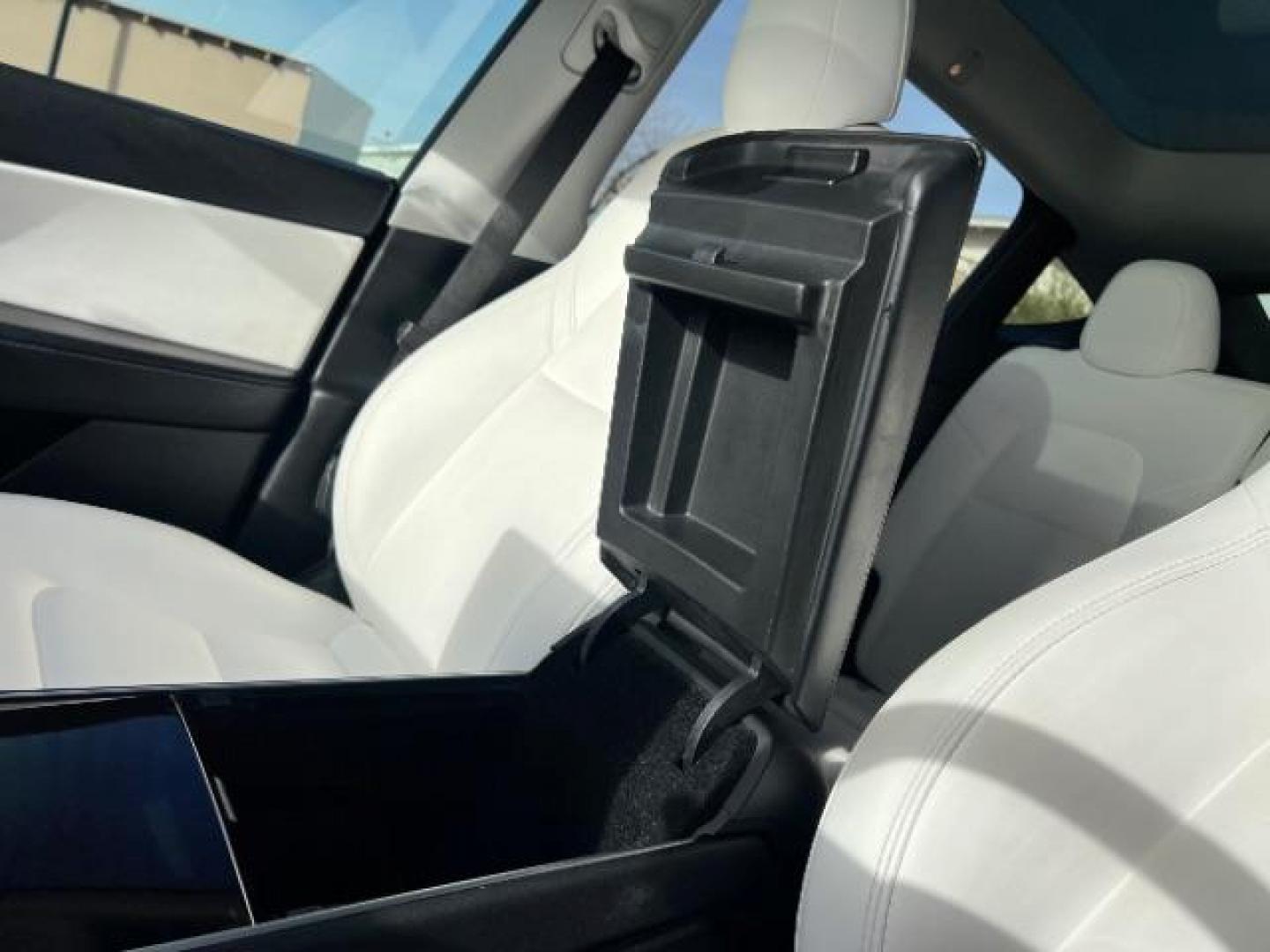 2021 White /White/Black Tesla Model Y Long Range Dual Motor All-Wheel Drive (5YJYGDEE5MF) with an ELECTRIC engine, Electric transmission, located at 1865 East Red Hills Pkwy, St. George, 84770, (435) 628-0023, 37.120850, -113.543640 - Excellent Tesla Model Y Long Range All Wheel Drive. With Full Self Drive paid for ($8k add on) Which is no longer available to buy. All our Teslas come with charging kit. Color changing wrap is a little rough but will still turn heads. Battery is healthy. Gets 275 on full charge. Clean title, no a - Photo#19