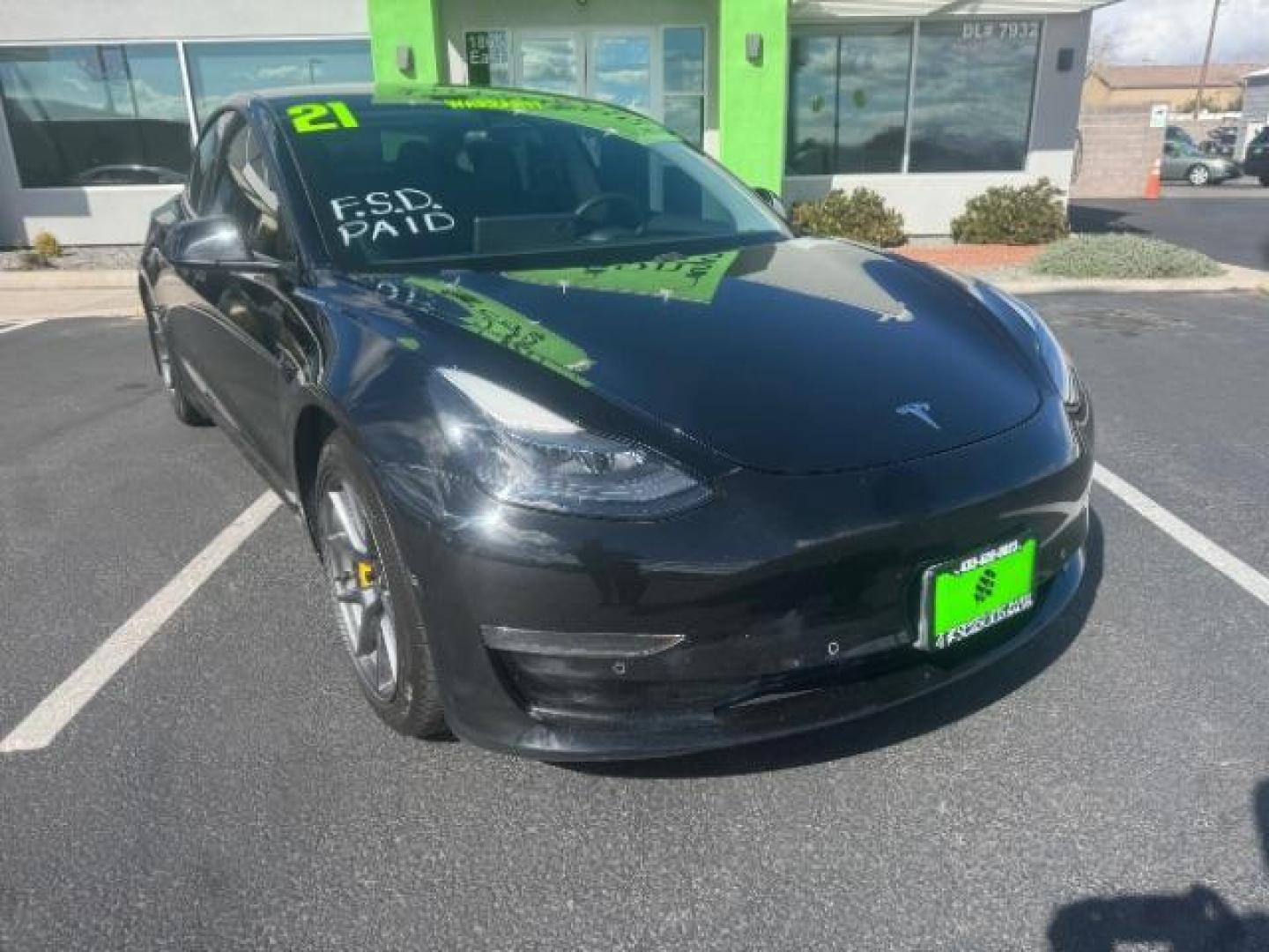 2021 Solid Black /Black Tesla Model 3 Long Range Dual Motor All-Wheel Drive (5YJ3E1EB9MF) with an ELECTRIC engine, Electric transmission, located at 1865 East Red Hills Pkwy, St. George, 84770, (435) 628-0023, 37.120850, -113.543640 - Excellent Tesla Model 3 Long Range All Wheel Drive. With Full Self Drive paid for ($8k add on) Which is no longer available to buy. All our Teslas come with charging kits. Battery is 98% healthy. Gets 310 on full charge! Amazing for this year. Clean title, no accidents Still has remaining 120k mi - Photo#1