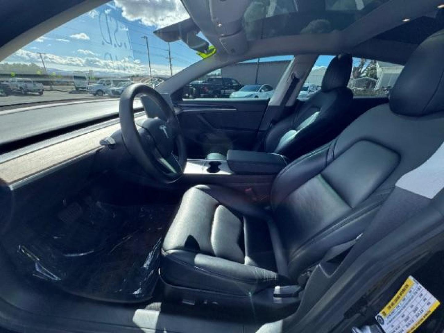 2021 Solid Black /Black Tesla Model 3 Long Range Dual Motor All-Wheel Drive (5YJ3E1EB9MF) with an ELECTRIC engine, Electric transmission, located at 1865 East Red Hills Pkwy, St. George, 84770, (435) 628-0023, 37.120850, -113.543640 - Excellent Tesla Model 3 Long Range All Wheel Drive. With Full Self Drive paid for ($8k add on) Which is no longer available to buy. All our Teslas come with charging kits. Battery is 98% healthy. Gets 310 on full charge! Amazing for this year. Clean title, no accidents Still has remaining 120k mi - Photo#9