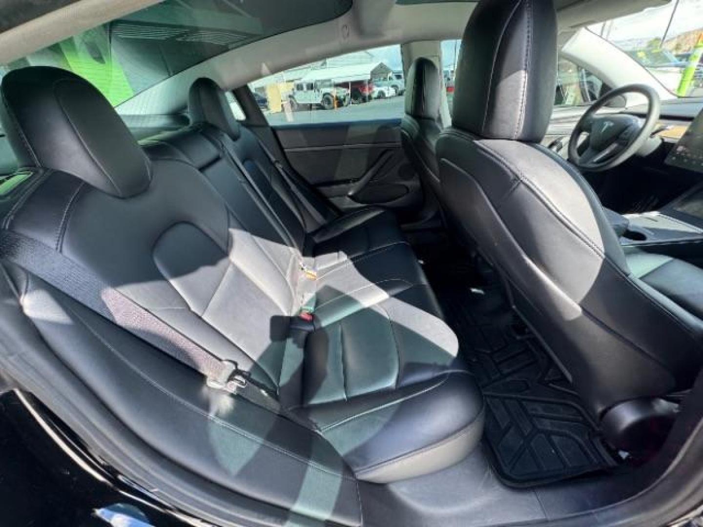 2021 Solid Black /Black Tesla Model 3 Long Range Dual Motor All-Wheel Drive (5YJ3E1EB9MF) with an ELECTRIC engine, Electric transmission, located at 1865 East Red Hills Pkwy, St. George, 84770, (435) 628-0023, 37.120850, -113.543640 - Excellent Tesla Model 3 Long Range All Wheel Drive. With Full Self Drive paid for ($8k add on) Which is no longer available to buy. All our Teslas come with charging kits. Battery is 98% healthy. Gets 310 on full charge! Amazing for this year. Clean title, no accidents Still has remaining 120k mi - Photo#18