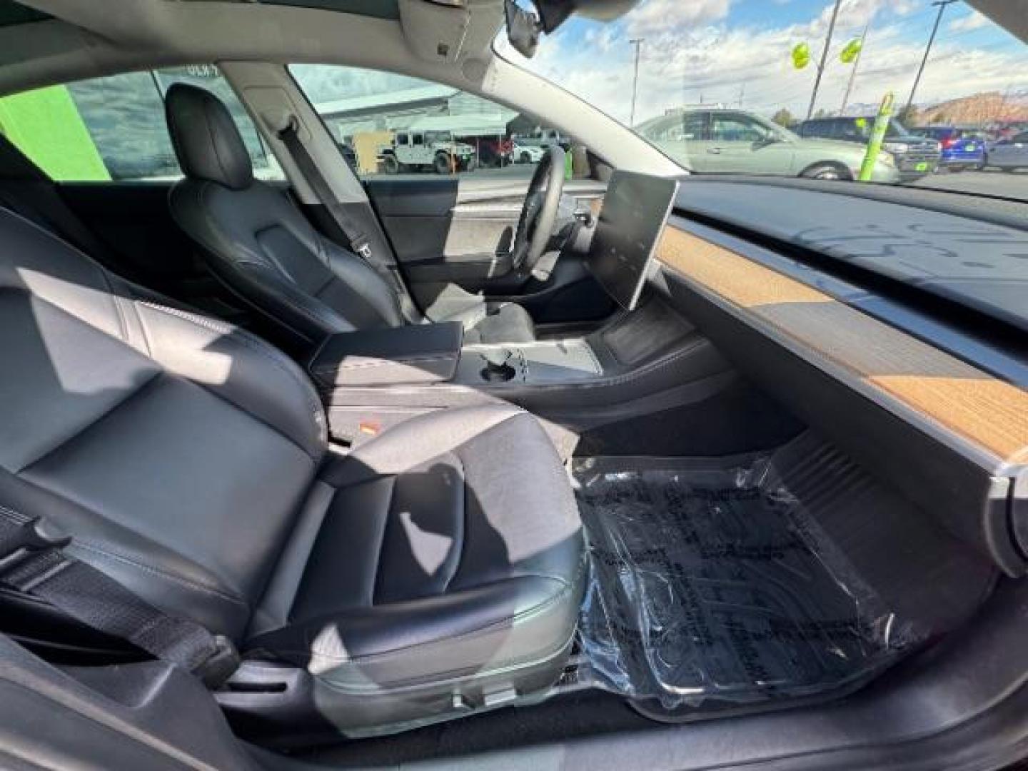 2021 Solid Black /Black Tesla Model 3 Long Range Dual Motor All-Wheel Drive (5YJ3E1EB9MF) with an ELECTRIC engine, Electric transmission, located at 1865 East Red Hills Pkwy, St. George, 84770, (435) 628-0023, 37.120850, -113.543640 - Excellent Tesla Model 3 Long Range All Wheel Drive. With Full Self Drive paid for ($8k add on) Which is no longer available to buy. All our Teslas come with charging kits. Battery is 98% healthy. Gets 310 on full charge! Amazing for this year. Clean title, no accidents Still has remaining 120k mi - Photo#19