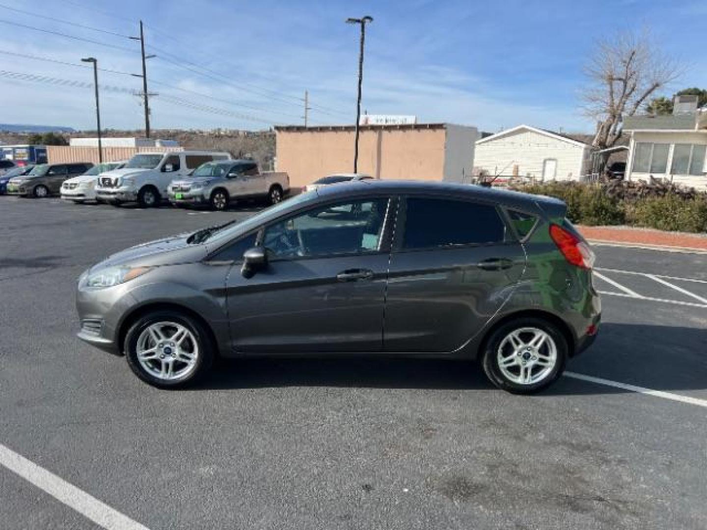 2019 Magnetic Metallic /Charcoal Black Ford Fiesta SE (3FADP4EJ5KM) with an 1.6L I-4 DOHC engine, Automatic transmission, located at 940 North Main Street, Cedar City, UT, 84720, (435) 628-0023, 37.692936, -113.061897 - We specialize in helping ALL people get the best financing available. No matter your credit score, good, bad or none we can get you an amazing rate. Had a bankruptcy, divorce, or repossessions? We give you the green light to get your credit back on the road. Low down and affordable payments that fit - Photo#3
