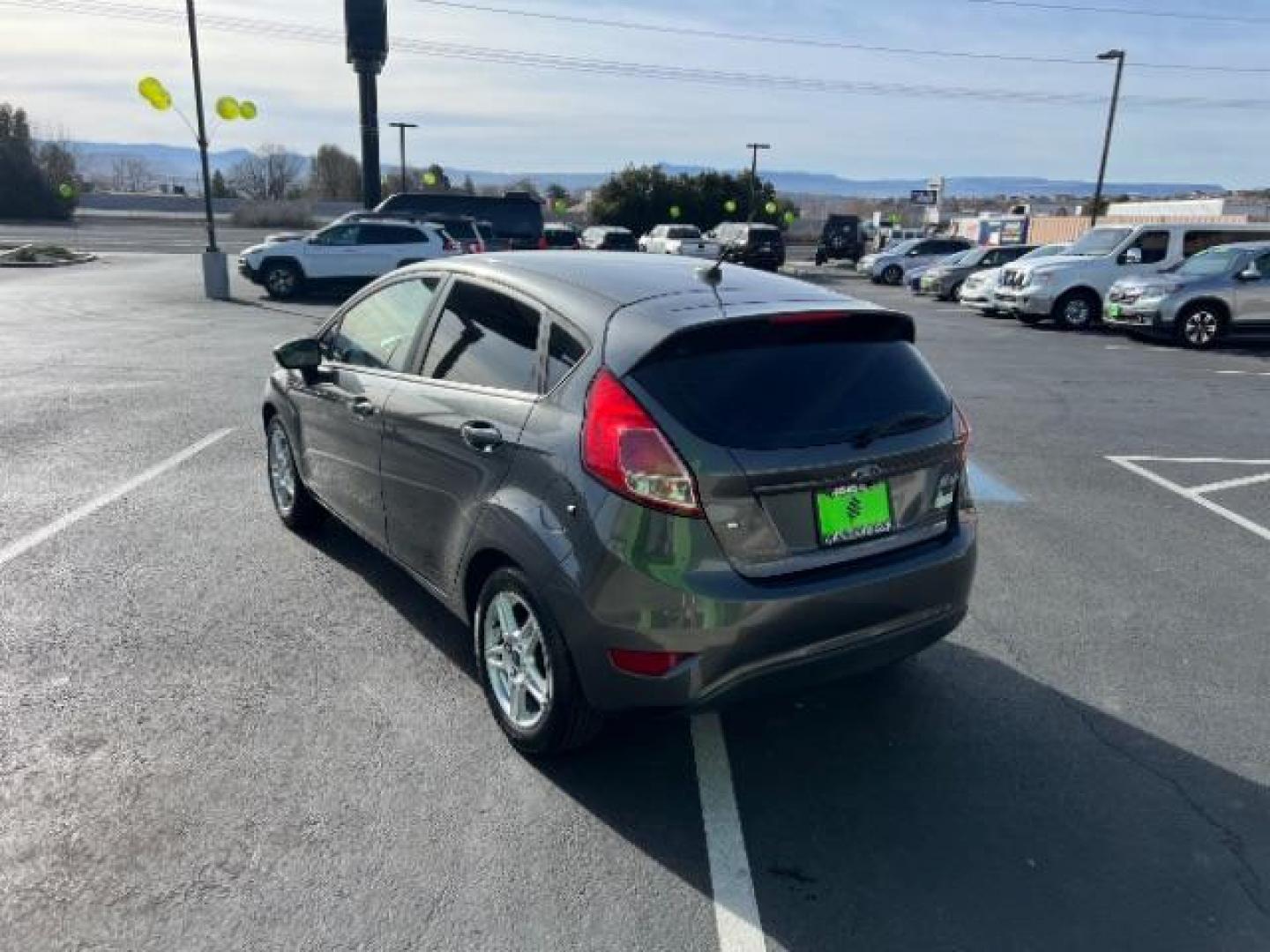 2019 Magnetic Metallic /Charcoal Black Ford Fiesta SE (3FADP4EJ5KM) with an 1.6L I-4 DOHC engine, Automatic transmission, located at 940 North Main Street, Cedar City, UT, 84720, (435) 628-0023, 37.692936, -113.061897 - We specialize in helping ALL people get the best financing available. No matter your credit score, good, bad or none we can get you an amazing rate. Had a bankruptcy, divorce, or repossessions? We give you the green light to get your credit back on the road. Low down and affordable payments that fit - Photo#4