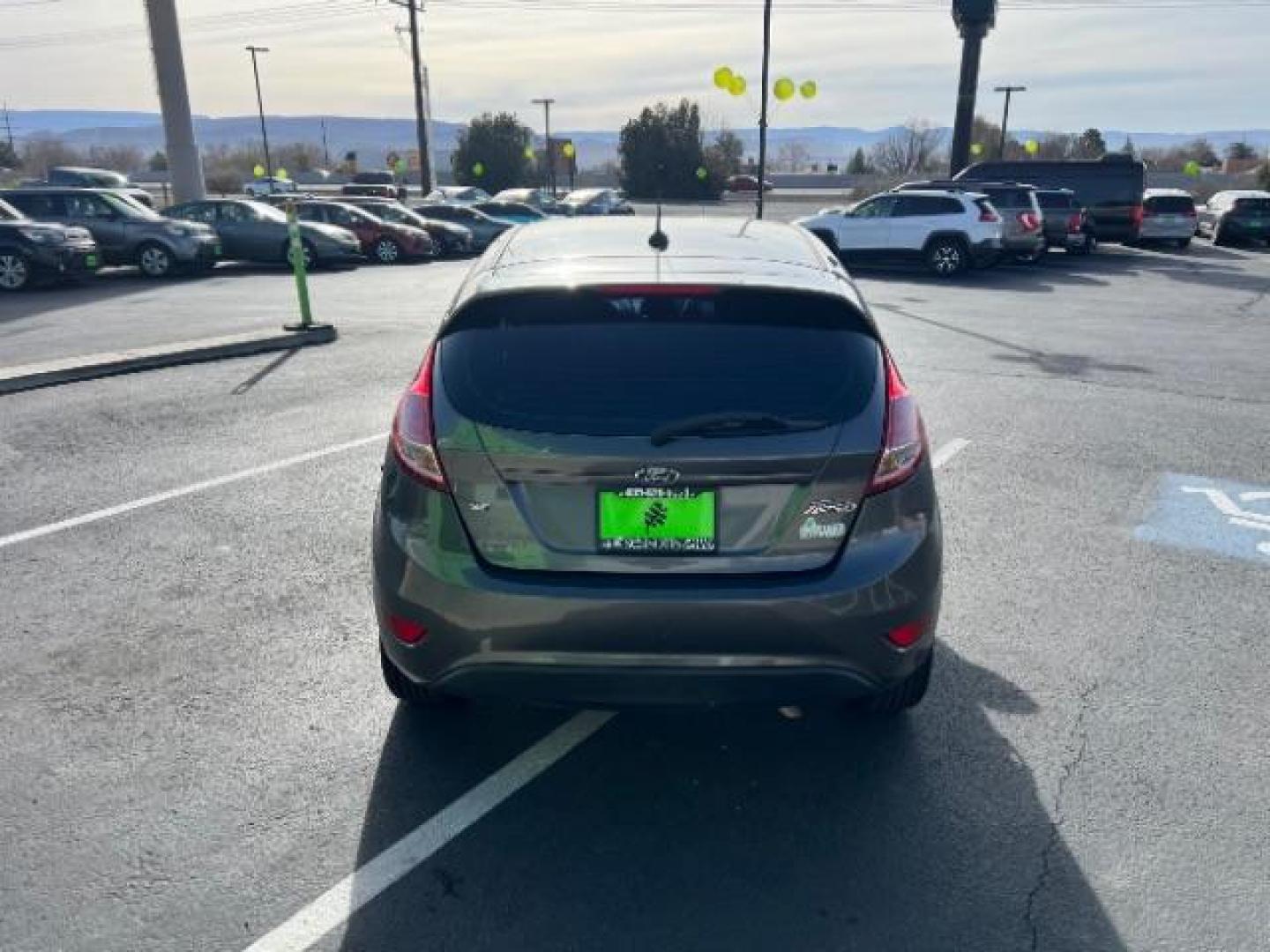 2019 Magnetic Metallic /Charcoal Black Ford Fiesta SE (3FADP4EJ5KM) with an 1.6L I-4 DOHC engine, Automatic transmission, located at 940 North Main Street, Cedar City, UT, 84720, (435) 628-0023, 37.692936, -113.061897 - We specialize in helping ALL people get the best financing available. No matter your credit score, good, bad or none we can get you an amazing rate. Had a bankruptcy, divorce, or repossessions? We give you the green light to get your credit back on the road. Low down and affordable payments that fit - Photo#5