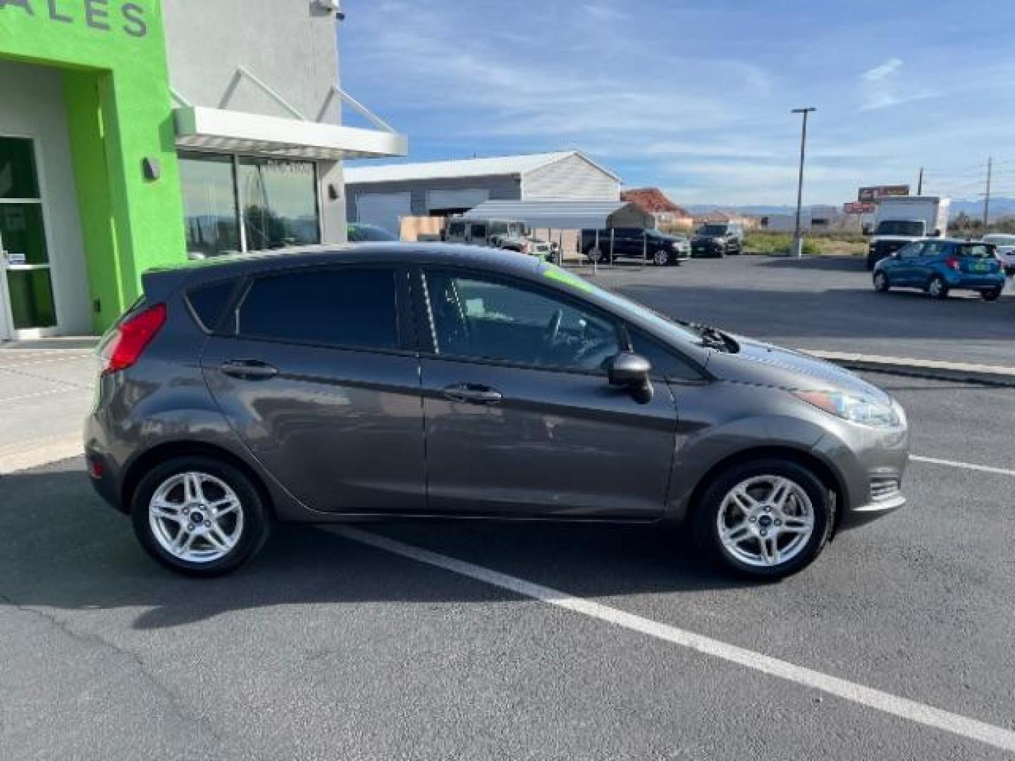 2019 Magnetic Metallic /Charcoal Black Ford Fiesta SE (3FADP4EJ5KM) with an 1.6L I-4 DOHC engine, Automatic transmission, located at 940 North Main Street, Cedar City, UT, 84720, (435) 628-0023, 37.692936, -113.061897 - We specialize in helping ALL people get the best financing available. No matter your credit score, good, bad or none we can get you an amazing rate. Had a bankruptcy, divorce, or repossessions? We give you the green light to get your credit back on the road. Low down and affordable payments that fit - Photo#6