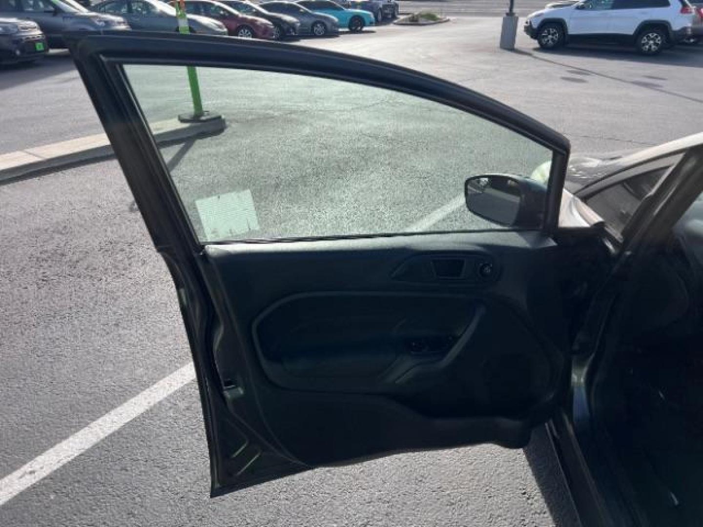 2019 Magnetic Metallic /Charcoal Black Ford Fiesta SE (3FADP4EJ5KM) with an 1.6L I-4 DOHC engine, Automatic transmission, located at 940 North Main Street, Cedar City, UT, 84720, (435) 628-0023, 37.692936, -113.061897 - We specialize in helping ALL people get the best financing available. No matter your credit score, good, bad or none we can get you an amazing rate. Had a bankruptcy, divorce, or repossessions? We give you the green light to get your credit back on the road. Low down and affordable payments that fit - Photo#12