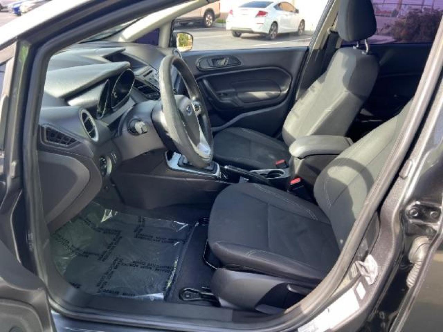 2019 Magnetic Metallic /Charcoal Black Ford Fiesta SE (3FADP4EJ5KM) with an 1.6L I-4 DOHC engine, Automatic transmission, located at 940 North Main Street, Cedar City, UT, 84720, (435) 628-0023, 37.692936, -113.061897 - We specialize in helping ALL people get the best financing available. No matter your credit score, good, bad or none we can get you an amazing rate. Had a bankruptcy, divorce, or repossessions? We give you the green light to get your credit back on the road. Low down and affordable payments that fit - Photo#14