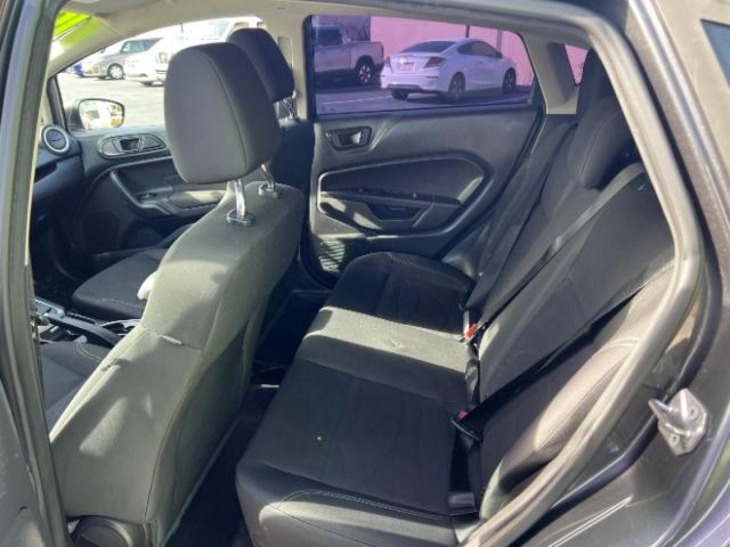 2019 Magnetic Metallic /Charcoal Black Ford Fiesta SE (3FADP4EJ5KM) with an 1.6L I-4 DOHC engine, Automatic transmission, located at 940 North Main Street, Cedar City, UT, 84720, (435) 628-0023, 37.692936, -113.061897 - We specialize in helping ALL people get the best financing available. No matter your credit score, good, bad or none we can get you an amazing rate. Had a bankruptcy, divorce, or repossessions? We give you the green light to get your credit back on the road. Low down and affordable payments that fit - Photo#21