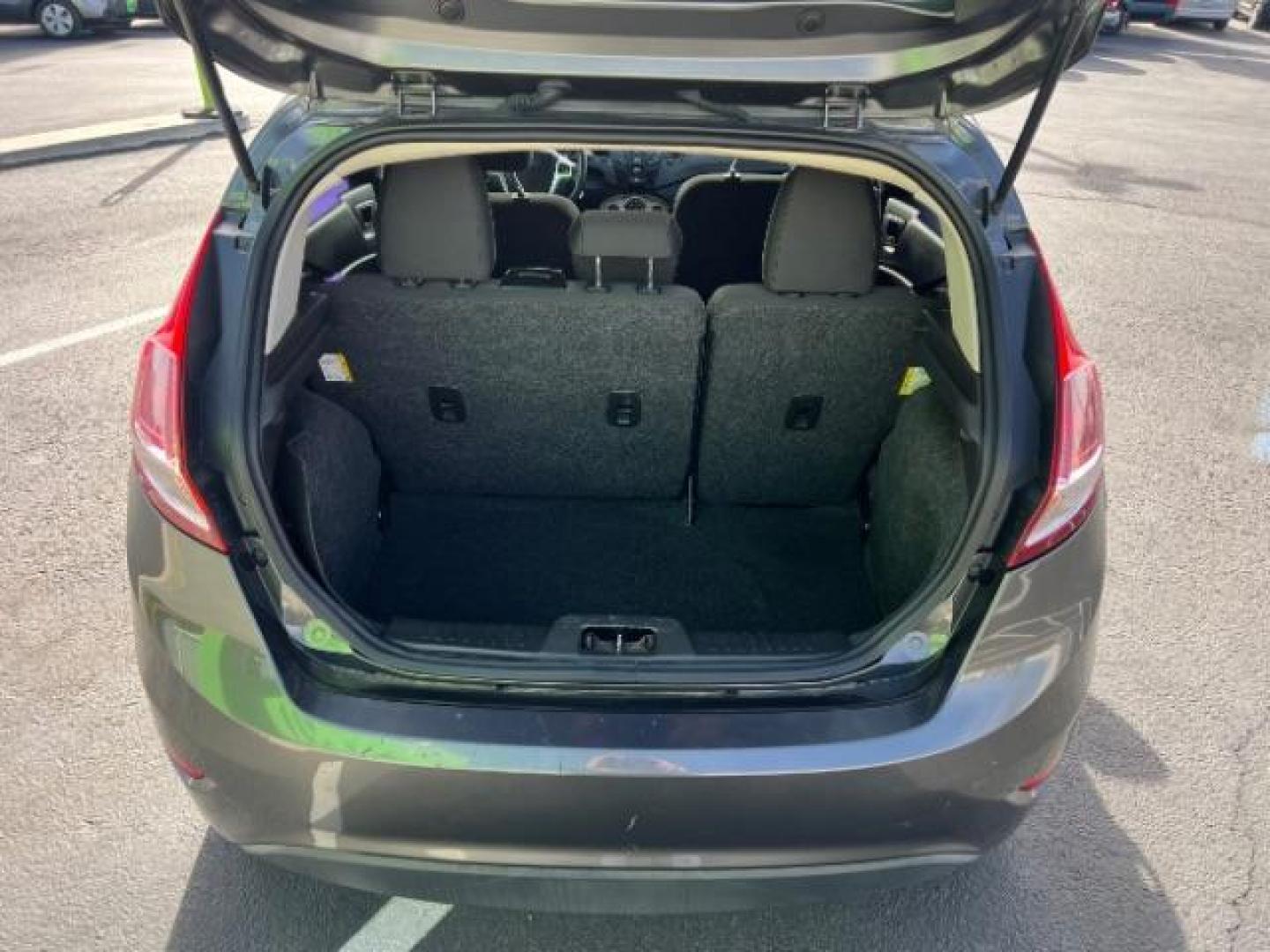 2019 Magnetic Metallic /Charcoal Black Ford Fiesta SE (3FADP4EJ5KM) with an 1.6L I-4 DOHC engine, Automatic transmission, located at 940 North Main Street, Cedar City, UT, 84720, (435) 628-0023, 37.692936, -113.061897 - We specialize in helping ALL people get the best financing available. No matter your credit score, good, bad or none we can get you an amazing rate. Had a bankruptcy, divorce, or repossessions? We give you the green light to get your credit back on the road. Low down and affordable payments that fit - Photo#23