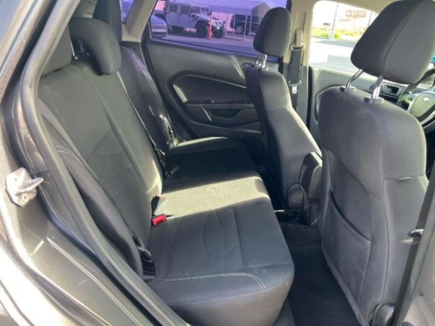 2019 Magnetic Metallic /Charcoal Black Ford Fiesta SE (3FADP4EJ5KM) with an 1.6L I-4 DOHC engine, Automatic transmission, located at 940 North Main Street, Cedar City, UT, 84720, (435) 628-0023, 37.692936, -113.061897 - We specialize in helping ALL people get the best financing available. No matter your credit score, good, bad or none we can get you an amazing rate. Had a bankruptcy, divorce, or repossessions? We give you the green light to get your credit back on the road. Low down and affordable payments that fit - Photo#25