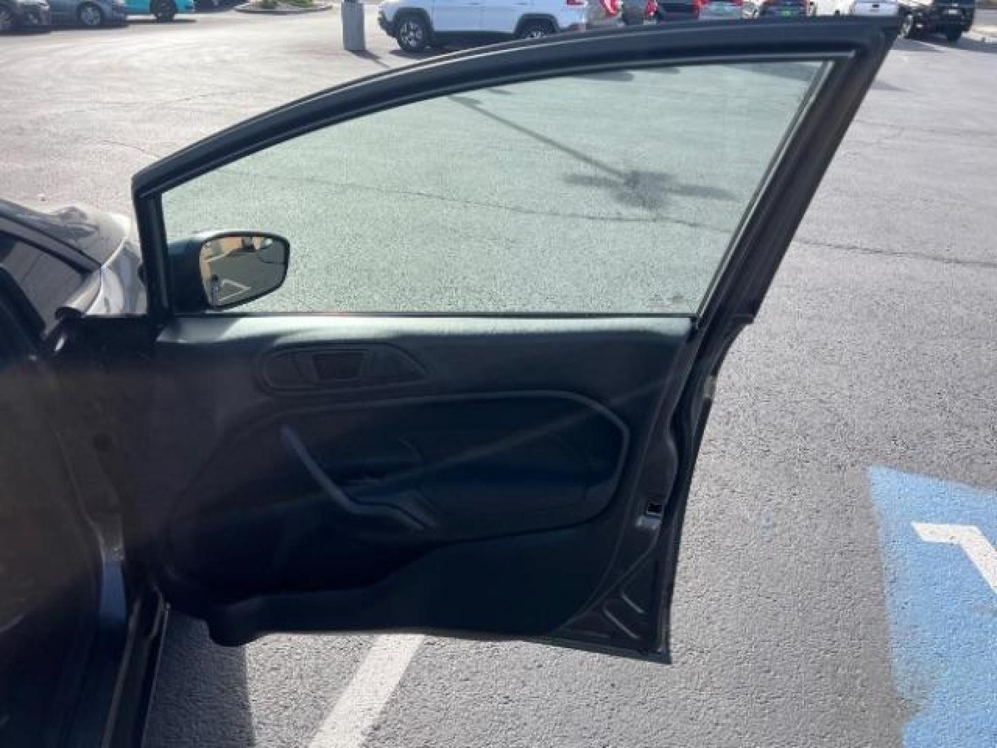 2019 Magnetic Metallic /Charcoal Black Ford Fiesta SE (3FADP4EJ5KM) with an 1.6L I-4 DOHC engine, Automatic transmission, located at 940 North Main Street, Cedar City, UT, 84720, (435) 628-0023, 37.692936, -113.061897 - We specialize in helping ALL people get the best financing available. No matter your credit score, good, bad or none we can get you an amazing rate. Had a bankruptcy, divorce, or repossessions? We give you the green light to get your credit back on the road. Low down and affordable payments that fit - Photo#26