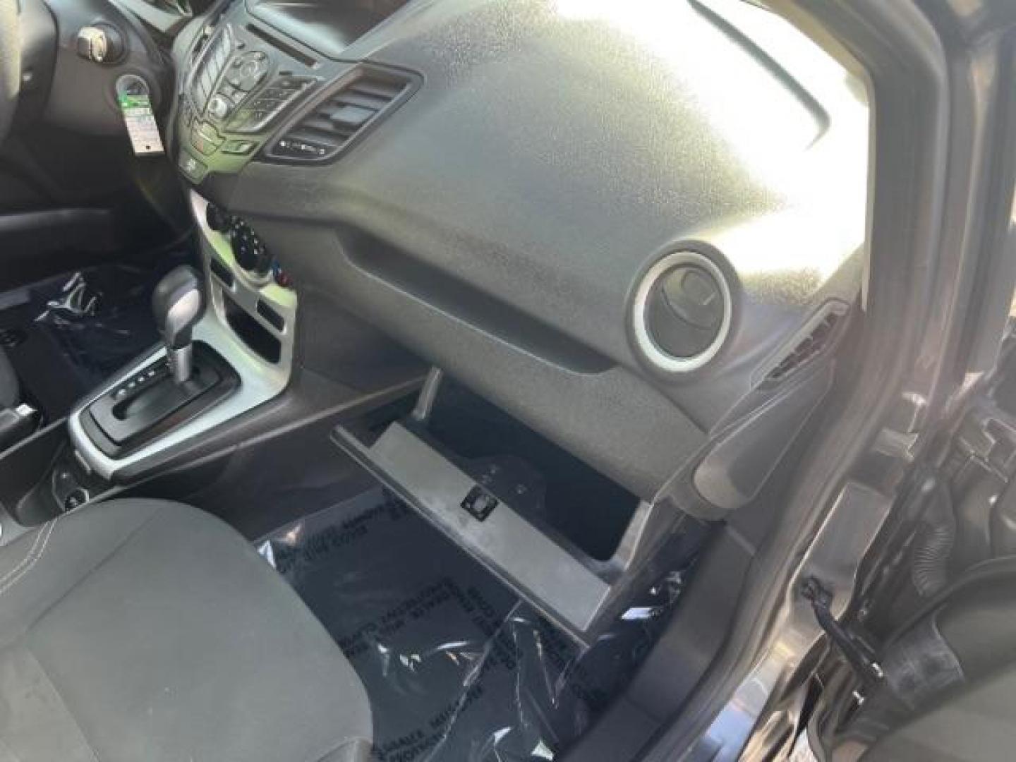 2019 Magnetic Metallic /Charcoal Black Ford Fiesta SE (3FADP4EJ5KM) with an 1.6L I-4 DOHC engine, Automatic transmission, located at 940 North Main Street, Cedar City, UT, 84720, (435) 628-0023, 37.692936, -113.061897 - We specialize in helping ALL people get the best financing available. No matter your credit score, good, bad or none we can get you an amazing rate. Had a bankruptcy, divorce, or repossessions? We give you the green light to get your credit back on the road. Low down and affordable payments that fit - Photo#28