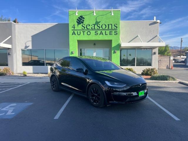 2024 Solid Black /Black Tesla Model X Long Range (7SAXCBE55RF) with an ELECTRIC engine, Electric transmission, located at 1865 East Red Hills Pkwy, St. George, 84770, (435) 628-0023, 37.120850, -113.543640 - Excellent Tesla Model X Long Range All Wheel Drive. With 3rd row 6 Seats, HW4, Homelink, Tow hitch, 20' WheelsLow miles and in near new condition. All our Teslas come with charging kit. Battery is healthy. Gets 300 on full charge. Clean title, no accidents, 1 Owner. Still has remaining Bumper 2 - Photo#0