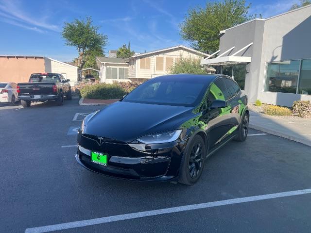 2024 Solid Black /Black Tesla Model X Long Range (7SAXCBE55RF) with an ELECTRIC engine, Electric transmission, located at 1865 East Red Hills Pkwy, St. George, 84770, (435) 628-0023, 37.120850, -113.543640 - Excellent Tesla Model X Long Range All Wheel Drive. With 3rd row 6 Seats, HW4, Homelink, Tow hitch, 20' WheelsLow miles and in near new condition. All our Teslas come with charging kit. Battery is healthy. Gets 300 on full charge. Clean title, no accidents, 1 Owner. Still has remaining Bumper 2 - Photo#4