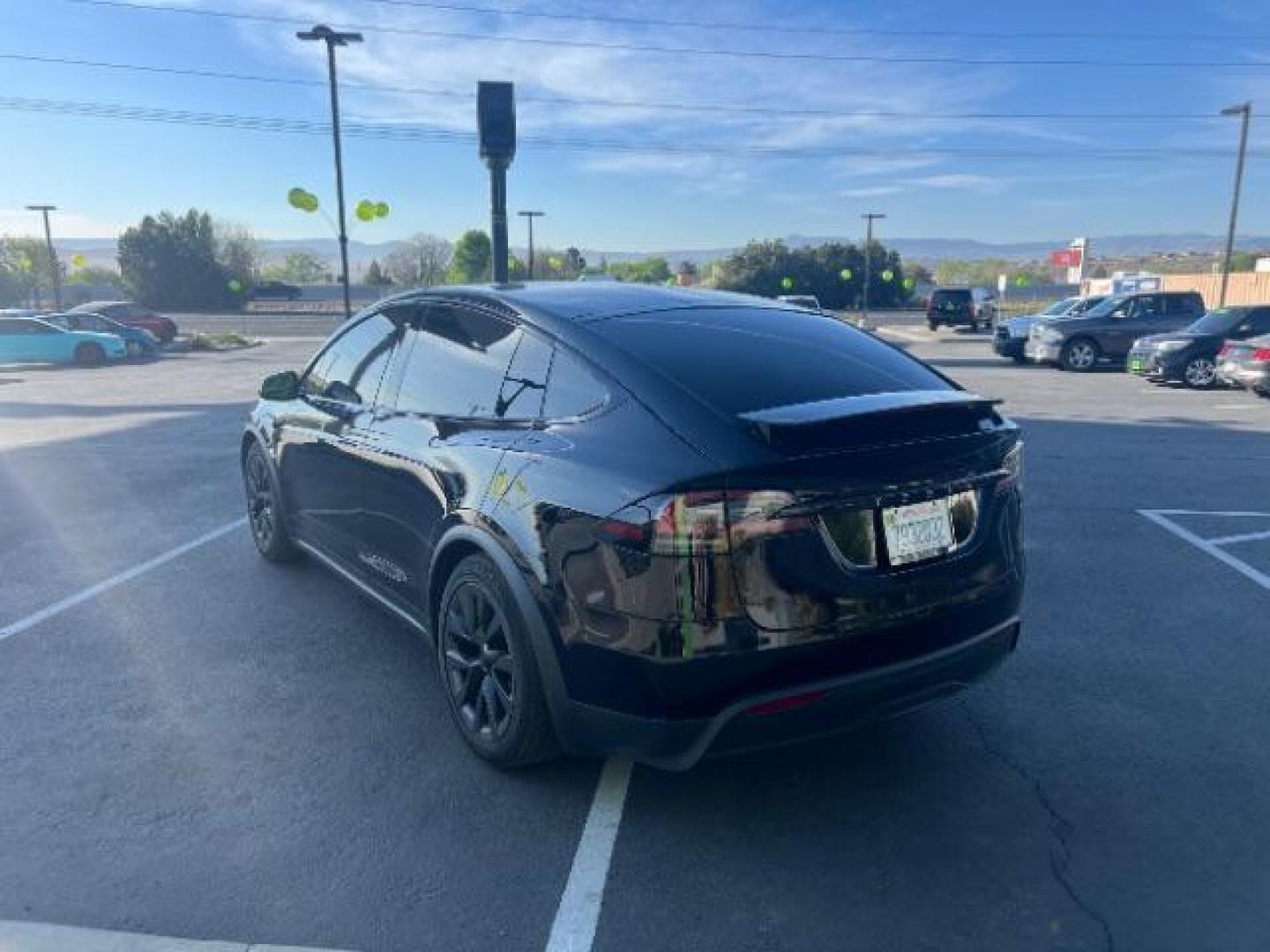 2024 Solid Black /Black Tesla Model X Long Range (7SAXCBE55RF) with an ELECTRIC engine, Electric transmission, located at 1865 East Red Hills Pkwy, St. George, 84770, (435) 628-0023, 37.120850, -113.543640 - Photo#4