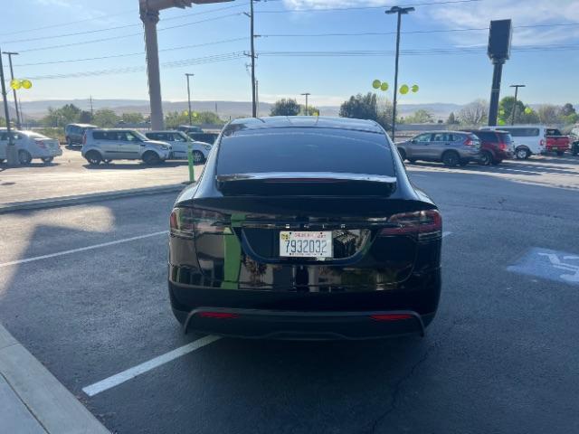 2024 Solid Black /Black Tesla Model X Long Range (7SAXCBE55RF) with an ELECTRIC engine, Electric transmission, located at 1865 East Red Hills Pkwy, St. George, 84770, (435) 628-0023, 37.120850, -113.543640 - Excellent Tesla Model X Long Range All Wheel Drive. With 3rd row 6 Seats, HW4, Homelink, Tow hitch, 20' WheelsLow miles and in near new condition. All our Teslas come with charging kit. Battery is healthy. Gets 300 on full charge. Clean title, no accidents, 1 Owner. Still has remaining Bumper 2 - Photo#7