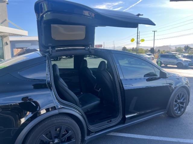 2024 Solid Black /Black Tesla Model X Long Range (7SAXCBE55RF) with an ELECTRIC engine, Electric transmission, located at 1865 East Red Hills Pkwy, St. George, 84770, (435) 628-0023, 37.120850, -113.543640 - Excellent Tesla Model X Long Range All Wheel Drive. With 3rd row 6 Seats, HW4, Homelink, Tow hitch, 20' WheelsLow miles and in near new condition. All our Teslas come with charging kit. Battery is healthy. Gets 300 on full charge. Clean title, no accidents, 1 Owner. Still has remaining Bumper 2 - Photo#23