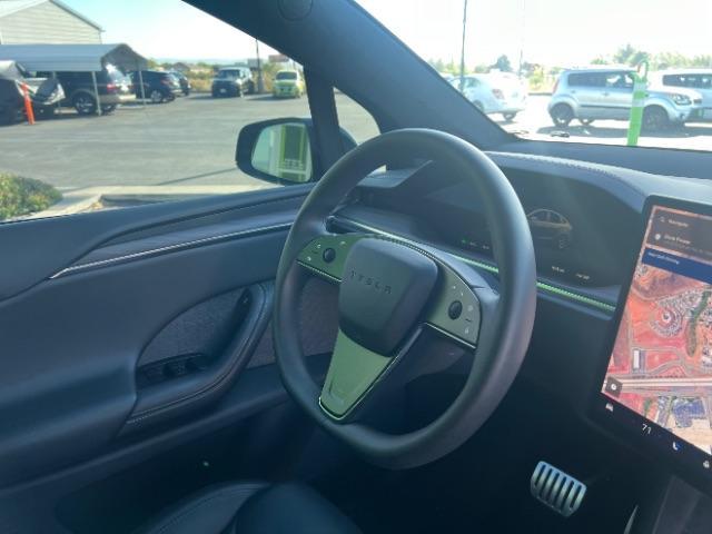 2024 Solid Black /Black Tesla Model X Long Range (7SAXCBE55RF) with an ELECTRIC engine, Electric transmission, located at 1865 East Red Hills Pkwy, St. George, 84770, (435) 628-0023, 37.120850, -113.543640 - Excellent Tesla Model X Long Range All Wheel Drive. With 3rd row 6 Seats, HW4, Homelink, Tow hitch, 20' WheelsLow miles and in near new condition. All our Teslas come with charging kit. Battery is healthy. Gets 300 on full charge. Clean title, no accidents, 1 Owner. Still has remaining Bumper 2 - Photo#26