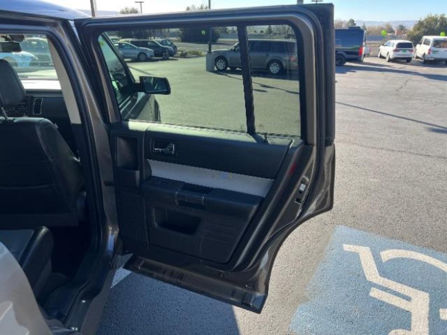 2013 Mineral Gray Metallic /Charcoal Black w/Gray Inserts Ford Flex Limited (2FMGK5D83DB) with an 3.5L V-6 DOHC engine, Automatic transmission, located at 1865 East Red Hills Pkwy, St. George, 84770, (435) 628-0023, 37.120850, -113.543640 - We specialize in helping ALL people get the best financing available. No matter your credit score, good, bad or none we can get you an amazing rate. Had a bankruptcy, divorce, or repossessions? We give you the green light to get your credit back on the road. Low down and affordable payments that fit - Photo#29