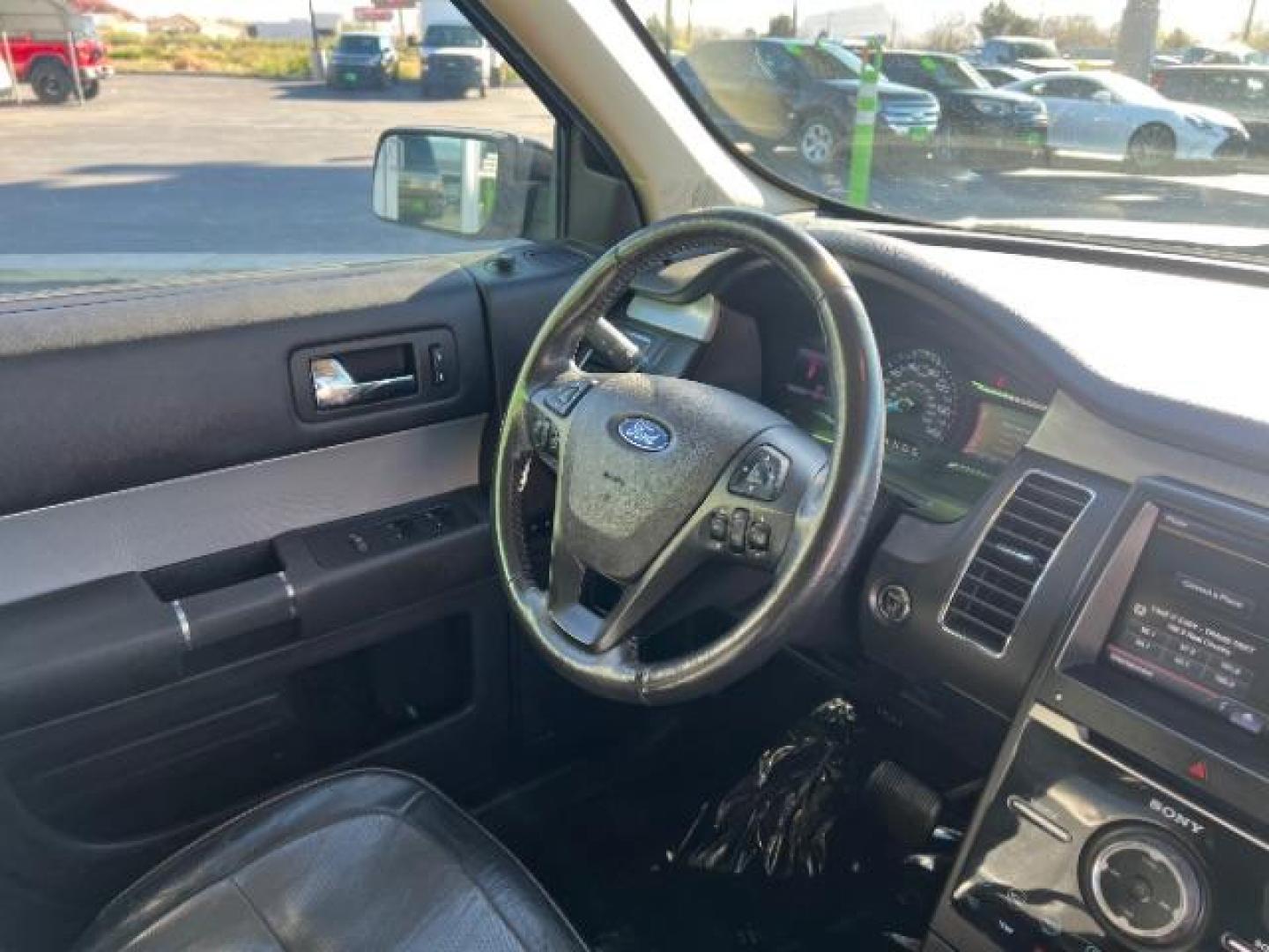 2013 Mineral Gray Metallic /Charcoal Black w/Gray Inserts Ford Flex Limited (2FMGK5D83DB) with an 3.5L V-6 DOHC engine, Automatic transmission, located at 1865 East Red Hills Pkwy, St. George, 84770, (435) 628-0023, 37.120850, -113.543640 - We specialize in helping ALL people get the best financing available. No matter your credit score, good, bad or none we can get you an amazing rate. Had a bankruptcy, divorce, or repossessions? We give you the green light to get your credit back on the road. Low down and affordable payments that fit - Photo#34