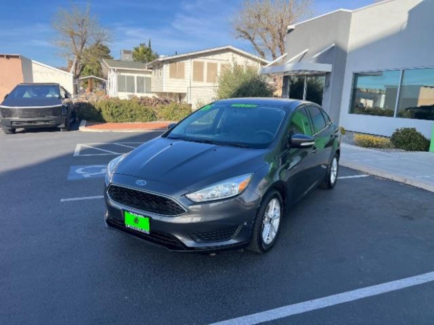 2016 Magnetic /Charcoal Black Ford Focus SE (1FADP3F2XGL) , Automatic transmission, located at 1865 East Red Hills Pkwy, St. George, 84770, (435) 628-0023, 37.120850, -113.543640 - We specialize in helping ALL people get the best financing available. No matter your credit score, good, bad or none we can get you an amazing rate. Had a bankruptcy, divorce, or repossessions? We give you the green light to get your credit back on the road. Low down and affordable payments that fit - Photo#2