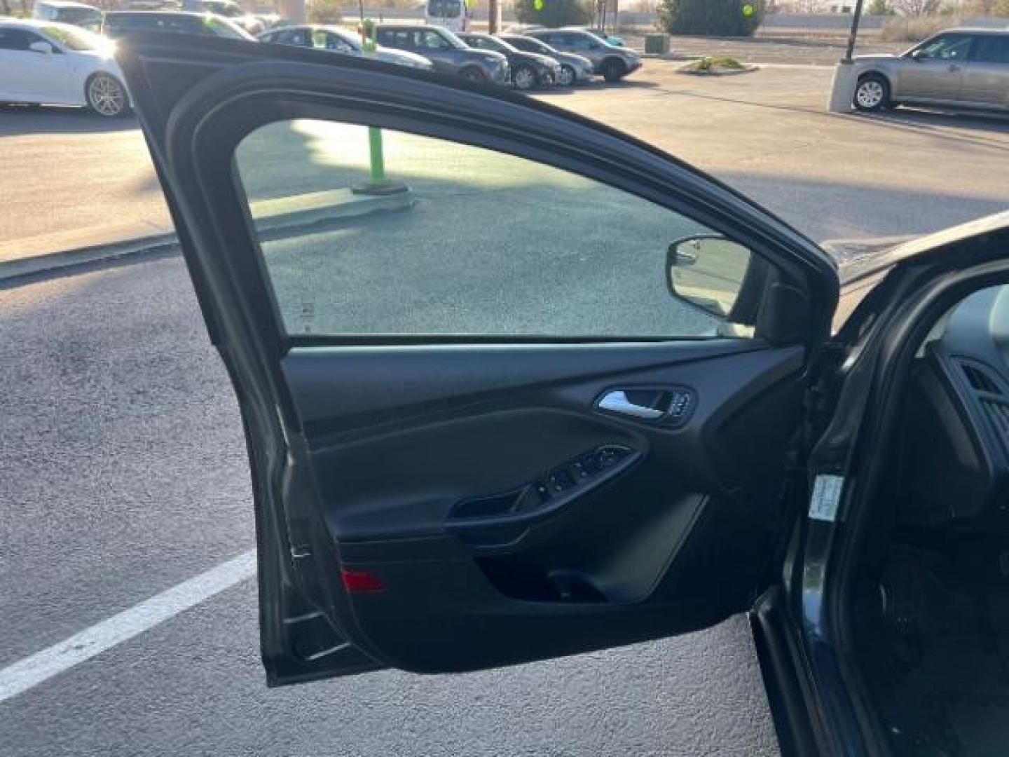 2016 Magnetic /Charcoal Black Ford Focus SE (1FADP3F2XGL) , Automatic transmission, located at 1865 East Red Hills Pkwy, St. George, 84770, (435) 628-0023, 37.120850, -113.543640 - We specialize in helping ALL people get the best financing available. No matter your credit score, good, bad or none we can get you an amazing rate. Had a bankruptcy, divorce, or repossessions? We give you the green light to get your credit back on the road. Low down and affordable payments that fit - Photo#12