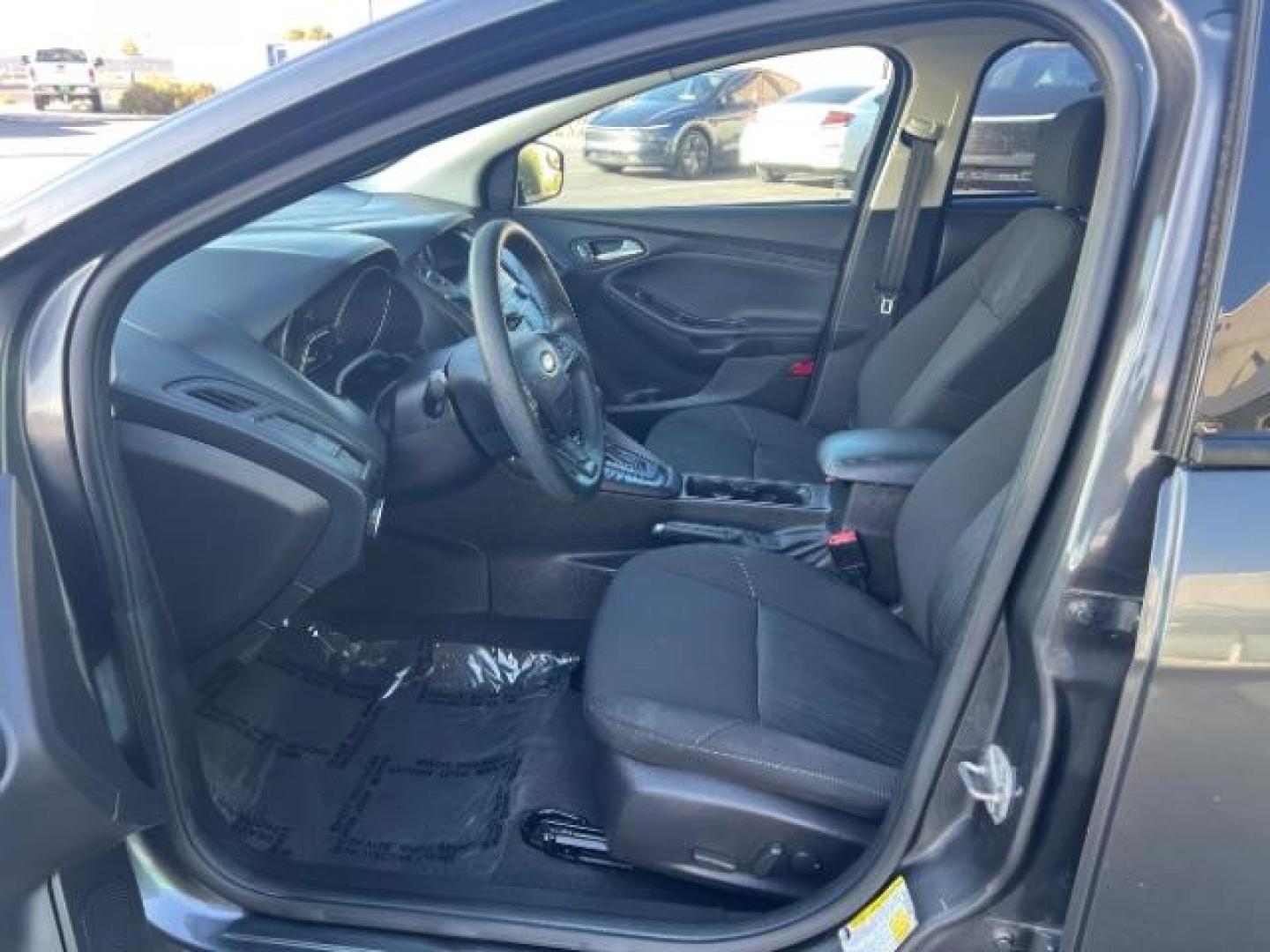 2016 Magnetic /Charcoal Black Ford Focus SE (1FADP3F2XGL) , Automatic transmission, located at 1865 East Red Hills Pkwy, St. George, 84770, (435) 628-0023, 37.120850, -113.543640 - We specialize in helping ALL people get the best financing available. No matter your credit score, good, bad or none we can get you an amazing rate. Had a bankruptcy, divorce, or repossessions? We give you the green light to get your credit back on the road. Low down and affordable payments that fit - Photo#14
