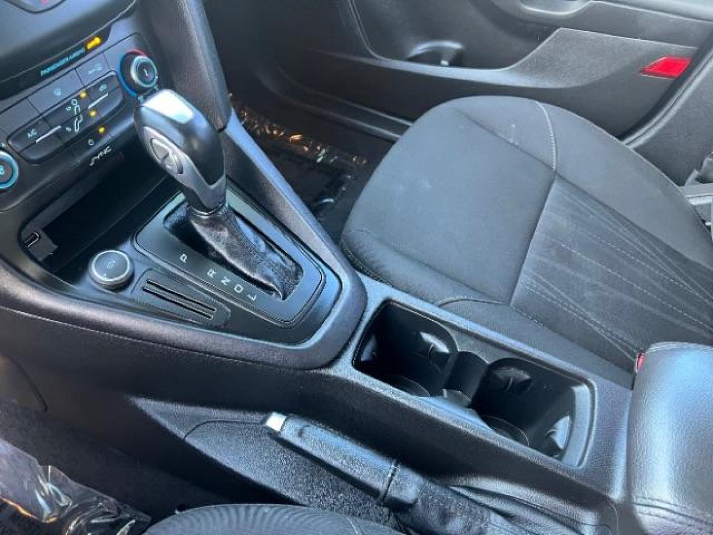 2016 Magnetic /Charcoal Black Ford Focus SE (1FADP3F2XGL) , Automatic transmission, located at 1865 East Red Hills Pkwy, St. George, 84770, (435) 628-0023, 37.120850, -113.543640 - We specialize in helping ALL people get the best financing available. No matter your credit score, good, bad or none we can get you an amazing rate. Had a bankruptcy, divorce, or repossessions? We give you the green light to get your credit back on the road. Low down and affordable payments that fit - Photo#18