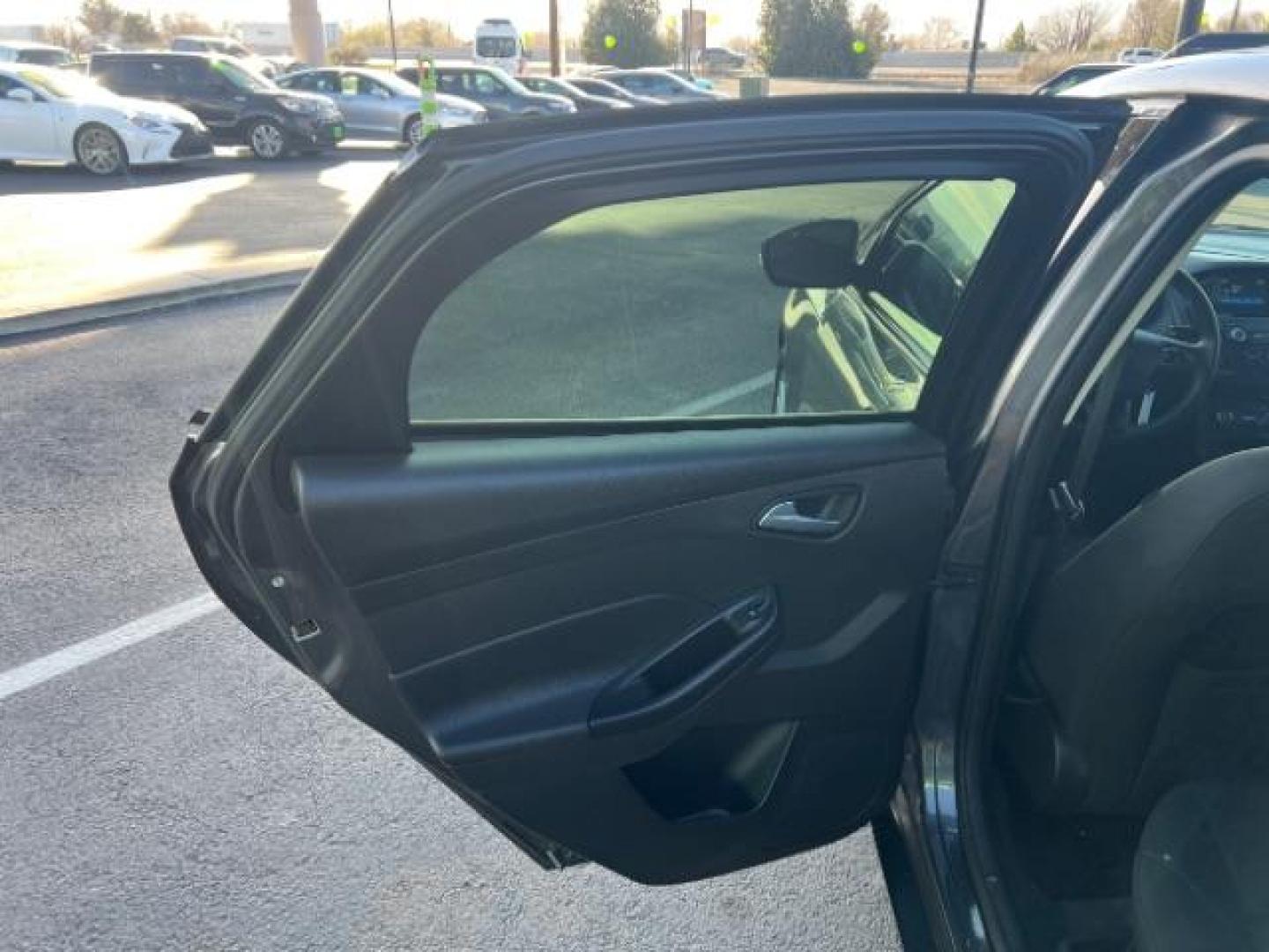 2016 Magnetic /Charcoal Black Ford Focus SE (1FADP3F2XGL) , Automatic transmission, located at 1865 East Red Hills Pkwy, St. George, 84770, (435) 628-0023, 37.120850, -113.543640 - We specialize in helping ALL people get the best financing available. No matter your credit score, good, bad or none we can get you an amazing rate. Had a bankruptcy, divorce, or repossessions? We give you the green light to get your credit back on the road. Low down and affordable payments that fit - Photo#20
