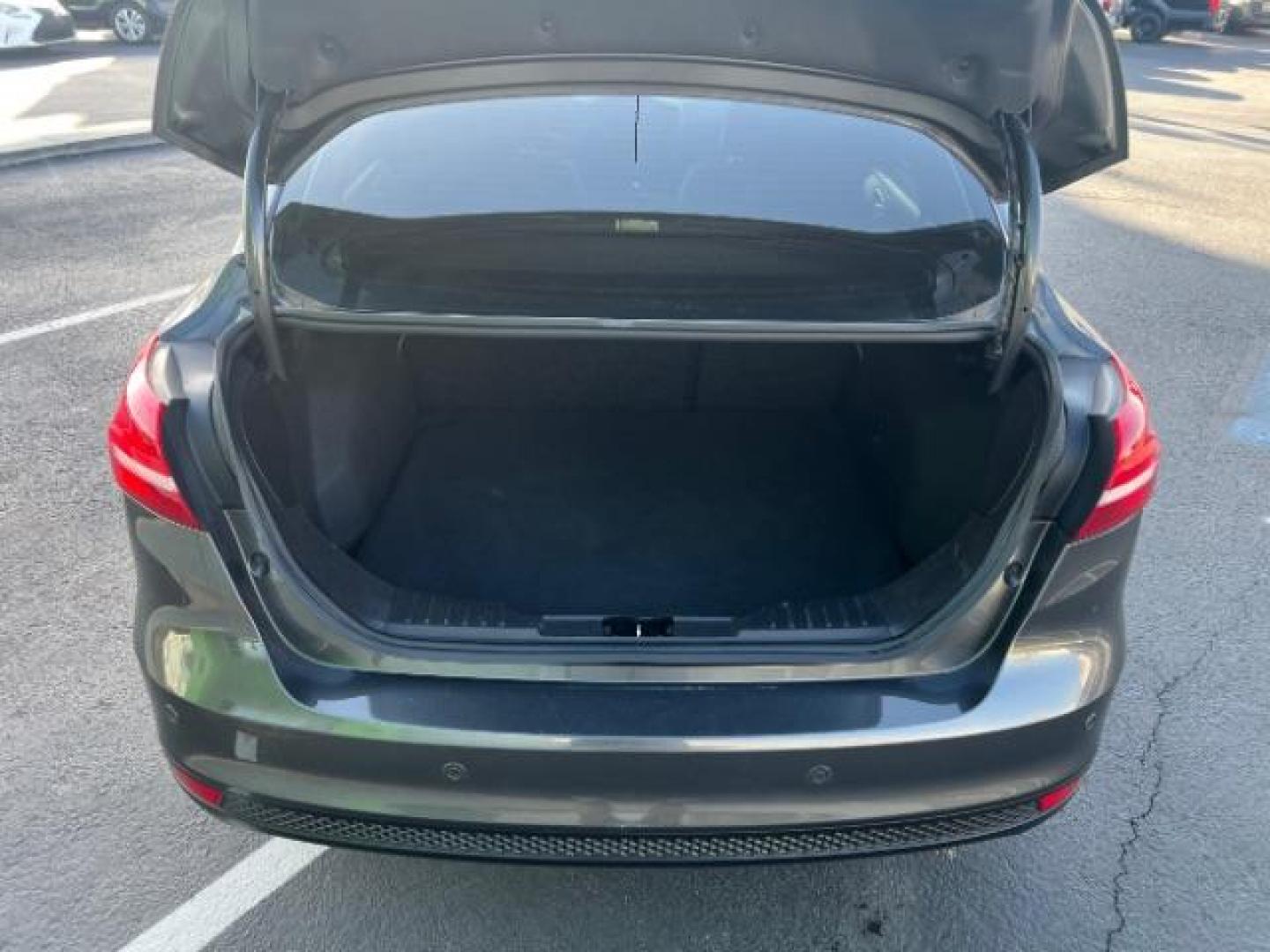 2016 Magnetic /Charcoal Black Ford Focus SE (1FADP3F2XGL) , Automatic transmission, located at 1865 East Red Hills Pkwy, St. George, 84770, (435) 628-0023, 37.120850, -113.543640 - We specialize in helping ALL people get the best financing available. No matter your credit score, good, bad or none we can get you an amazing rate. Had a bankruptcy, divorce, or repossessions? We give you the green light to get your credit back on the road. Low down and affordable payments that fit - Photo#23