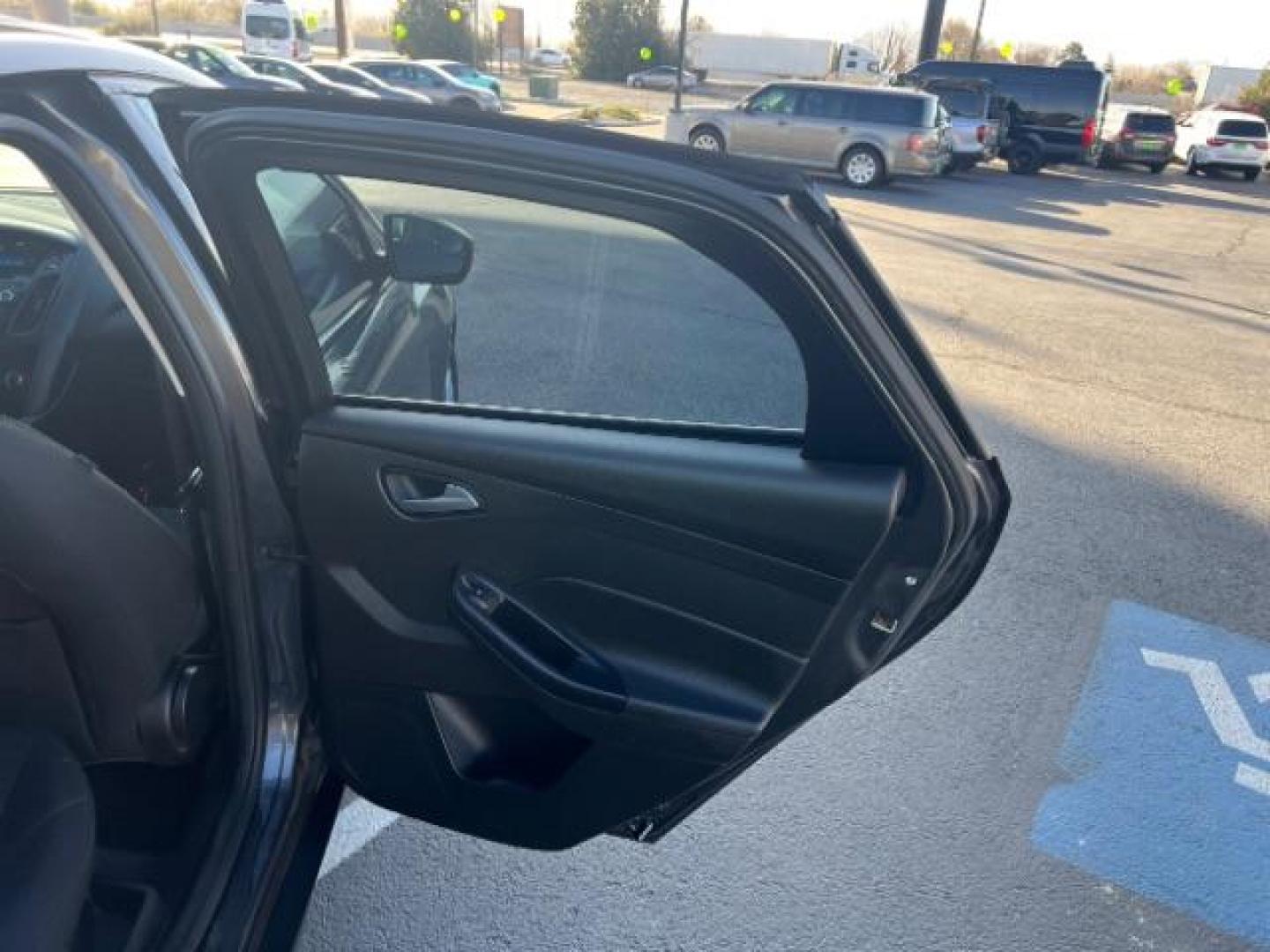 2016 Magnetic /Charcoal Black Ford Focus SE (1FADP3F2XGL) , Automatic transmission, located at 1865 East Red Hills Pkwy, St. George, 84770, (435) 628-0023, 37.120850, -113.543640 - We specialize in helping ALL people get the best financing available. No matter your credit score, good, bad or none we can get you an amazing rate. Had a bankruptcy, divorce, or repossessions? We give you the green light to get your credit back on the road. Low down and affordable payments that fit - Photo#24