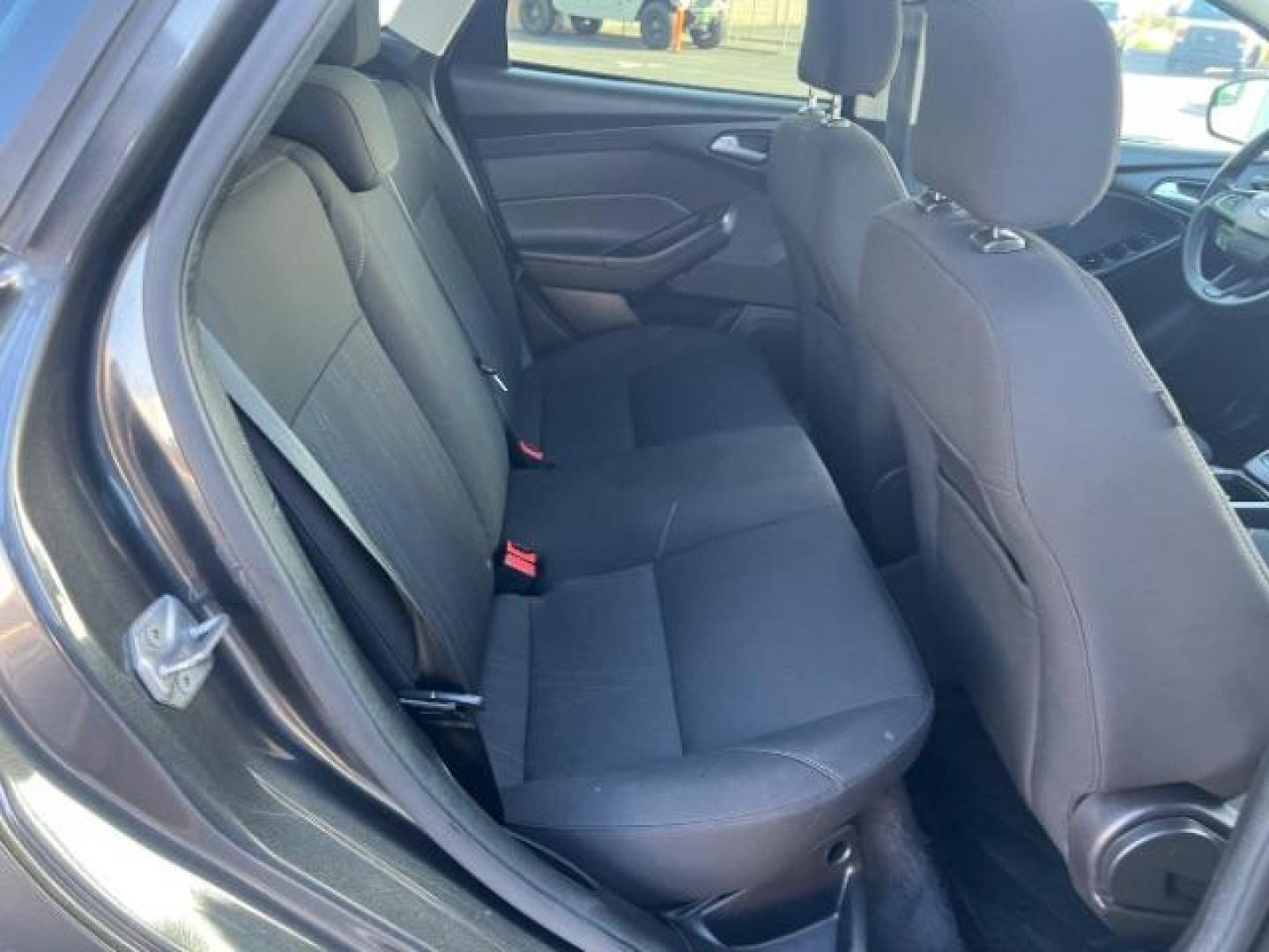 2016 Magnetic /Charcoal Black Ford Focus SE (1FADP3F2XGL) , Automatic transmission, located at 1865 East Red Hills Pkwy, St. George, 84770, (435) 628-0023, 37.120850, -113.543640 - We specialize in helping ALL people get the best financing available. No matter your credit score, good, bad or none we can get you an amazing rate. Had a bankruptcy, divorce, or repossessions? We give you the green light to get your credit back on the road. Low down and affordable payments that fit - Photo#25