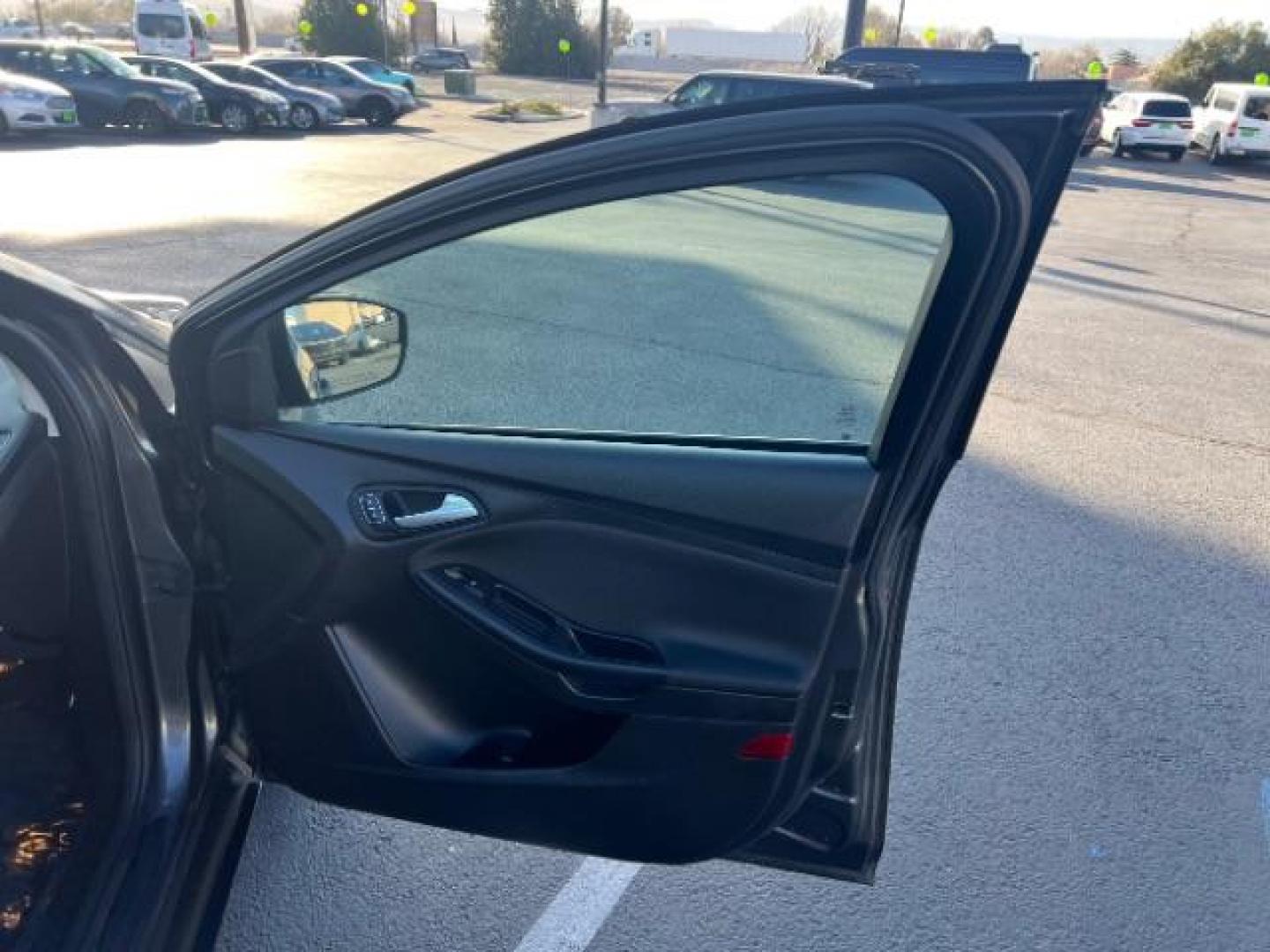 2016 Magnetic /Charcoal Black Ford Focus SE (1FADP3F2XGL) , Automatic transmission, located at 1865 East Red Hills Pkwy, St. George, 84770, (435) 628-0023, 37.120850, -113.543640 - We specialize in helping ALL people get the best financing available. No matter your credit score, good, bad or none we can get you an amazing rate. Had a bankruptcy, divorce, or repossessions? We give you the green light to get your credit back on the road. Low down and affordable payments that fit - Photo#26