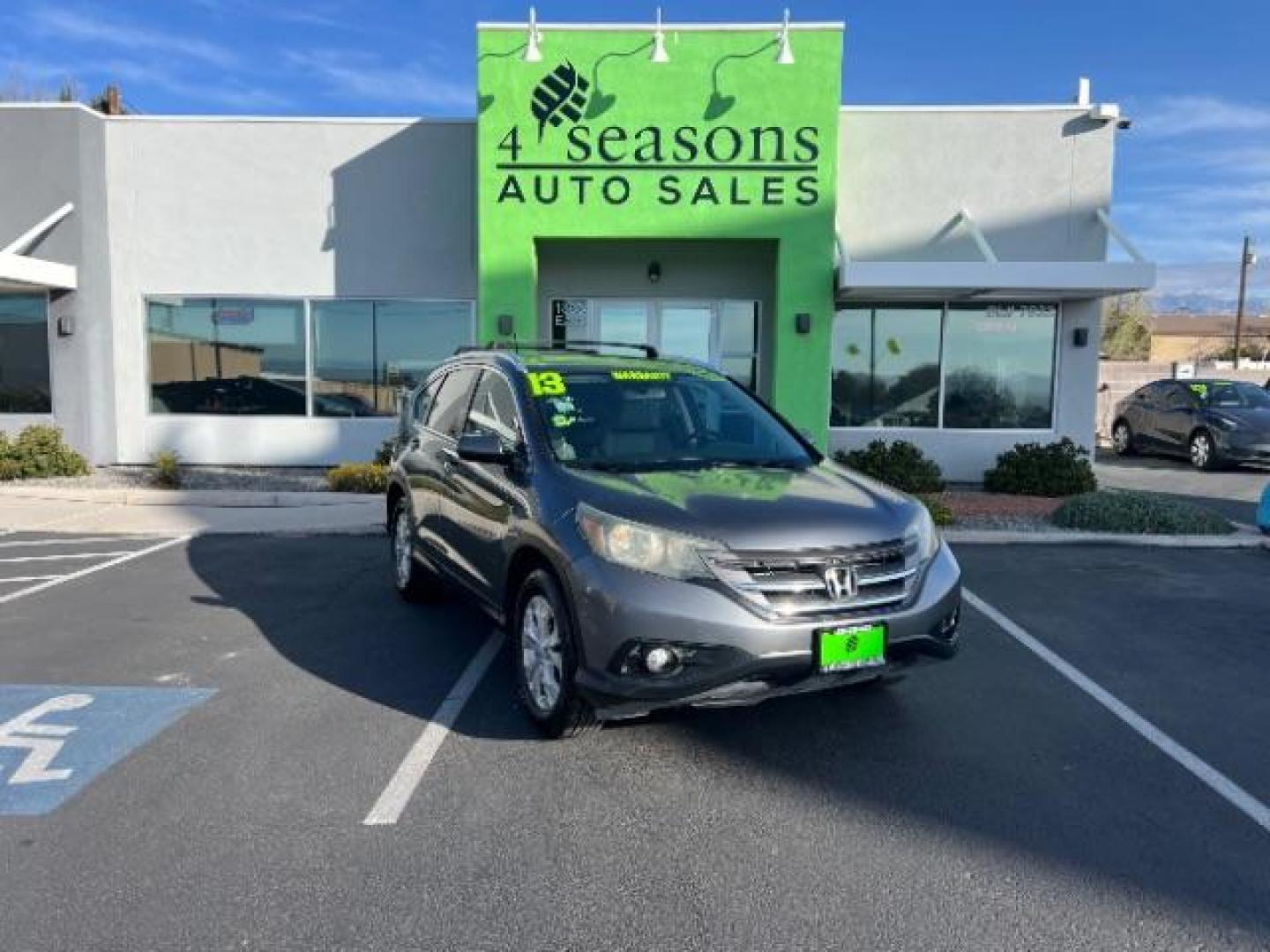 2013 Urban Titanium Metallic /Black Leather Interior Honda CR-V EX-L 4WD 5-Speed AT (2HKRM4H71DH) with an 2.4L L4 DOHC 16V engine, 5-Speed Automatic transmission, located at 940 North Main Street, Cedar City, UT, 84720, (435) 628-0023, 37.692936, -113.061897 - Photo#0
