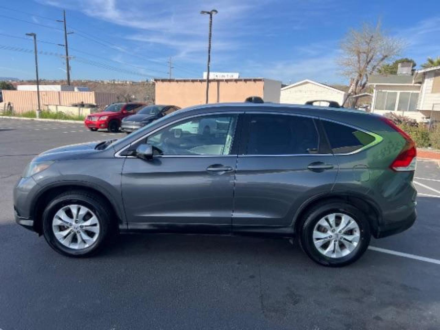 2013 Urban Titanium Metallic /Black Leather Interior Honda CR-V EX-L 4WD 5-Speed AT (2HKRM4H71DH) with an 2.4L L4 DOHC 16V engine, 5-Speed Automatic transmission, located at 940 North Main Street, Cedar City, UT, 84720, (435) 628-0023, 37.692936, -113.061897 - Photo#3