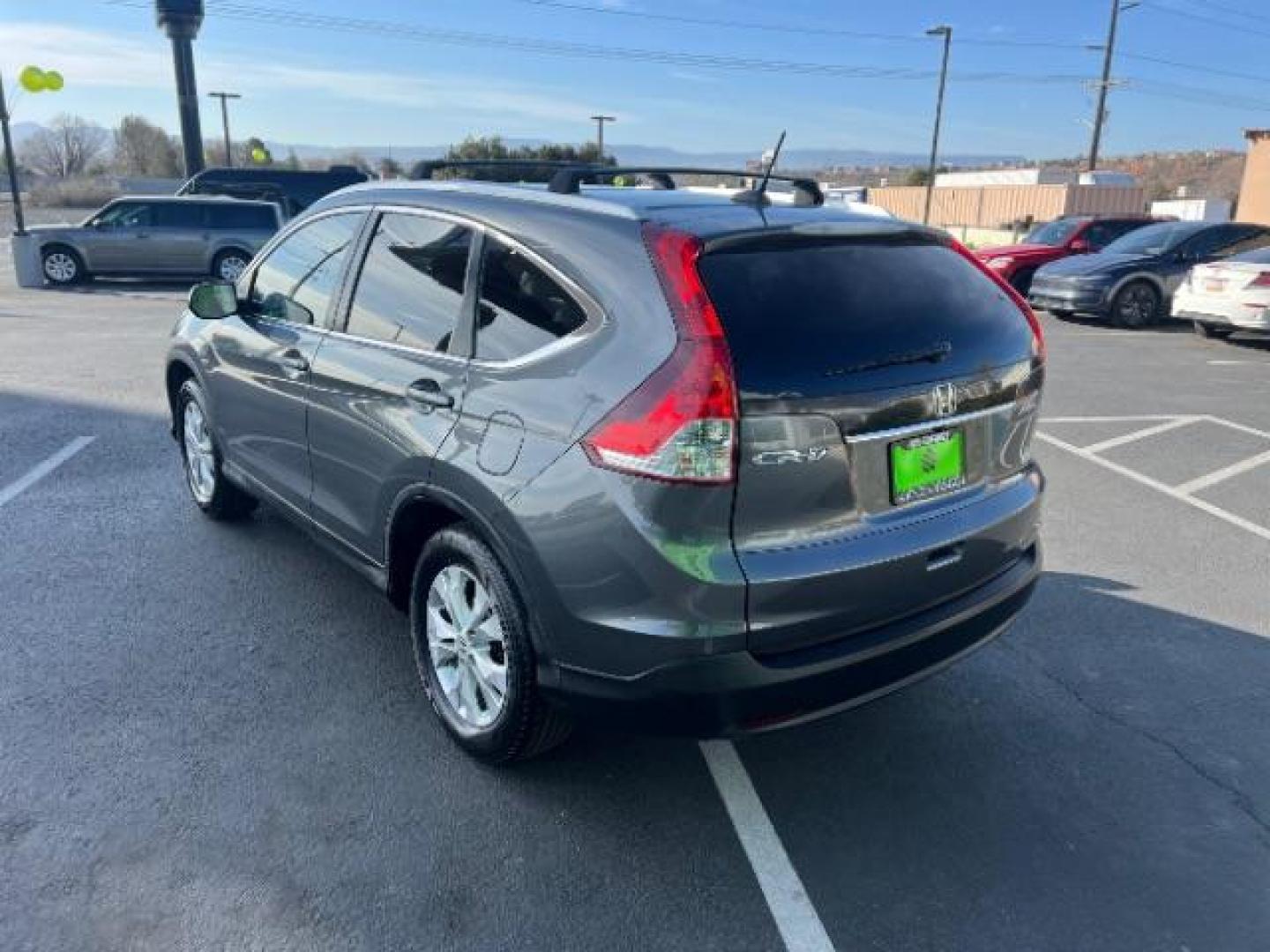 2013 Urban Titanium Metallic /Black Leather Interior Honda CR-V EX-L 4WD 5-Speed AT (2HKRM4H71DH) with an 2.4L L4 DOHC 16V engine, 5-Speed Automatic transmission, located at 940 North Main Street, Cedar City, UT, 84720, (435) 628-0023, 37.692936, -113.061897 - Photo#4