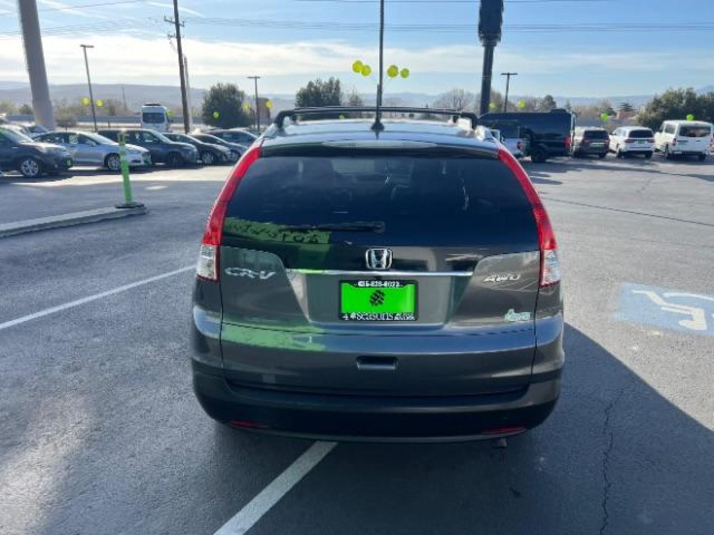 2013 Urban Titanium Metallic /Black Leather Interior Honda CR-V EX-L 4WD 5-Speed AT (2HKRM4H71DH) with an 2.4L L4 DOHC 16V engine, 5-Speed Automatic transmission, located at 940 North Main Street, Cedar City, UT, 84720, (435) 628-0023, 37.692936, -113.061897 - Photo#5