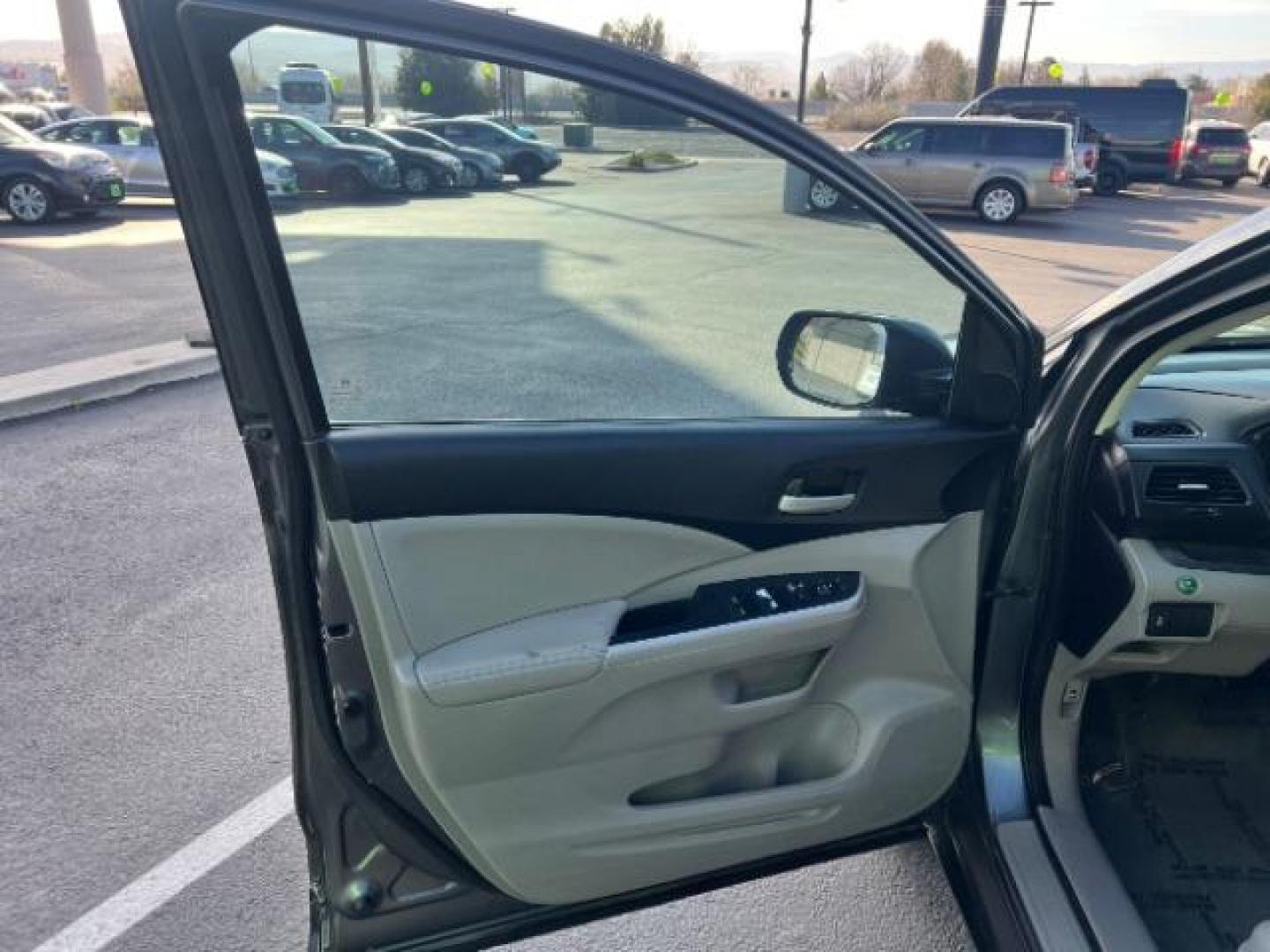 2013 Urban Titanium Metallic /Black Leather Interior Honda CR-V EX-L 4WD 5-Speed AT (2HKRM4H71DH) with an 2.4L L4 DOHC 16V engine, 5-Speed Automatic transmission, located at 940 North Main Street, Cedar City, UT, 84720, (435) 628-0023, 37.692936, -113.061897 - Photo#12