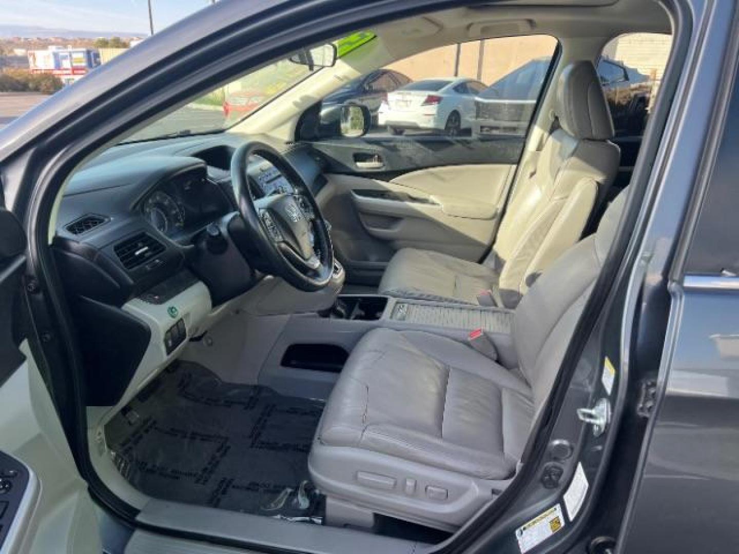 2013 Urban Titanium Metallic /Black Leather Interior Honda CR-V EX-L 4WD 5-Speed AT (2HKRM4H71DH) with an 2.4L L4 DOHC 16V engine, 5-Speed Automatic transmission, located at 940 North Main Street, Cedar City, UT, 84720, (435) 628-0023, 37.692936, -113.061897 - Photo#14