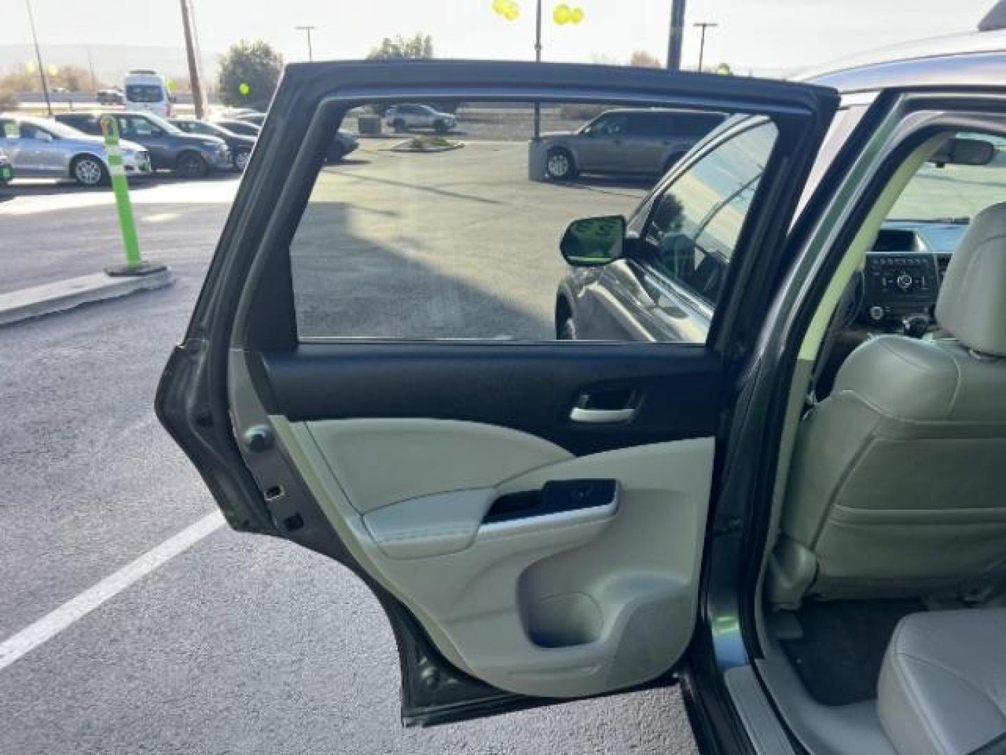 2013 Urban Titanium Metallic /Black Leather Interior Honda CR-V EX-L 4WD 5-Speed AT (2HKRM4H71DH) with an 2.4L L4 DOHC 16V engine, 5-Speed Automatic transmission, located at 940 North Main Street, Cedar City, UT, 84720, (435) 628-0023, 37.692936, -113.061897 - Photo#19