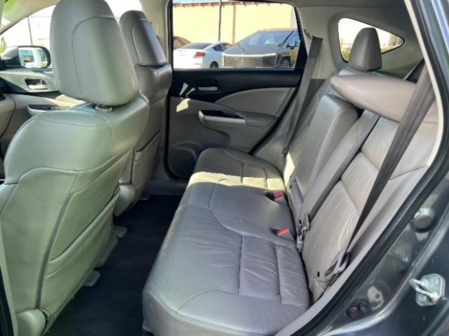 2013 Urban Titanium Metallic /Black Leather Interior Honda CR-V EX-L 4WD 5-Speed AT (2HKRM4H71DH) with an 2.4L L4 DOHC 16V engine, 5-Speed Automatic transmission, located at 940 North Main Street, Cedar City, UT, 84720, (435) 628-0023, 37.692936, -113.061897 - Photo#20