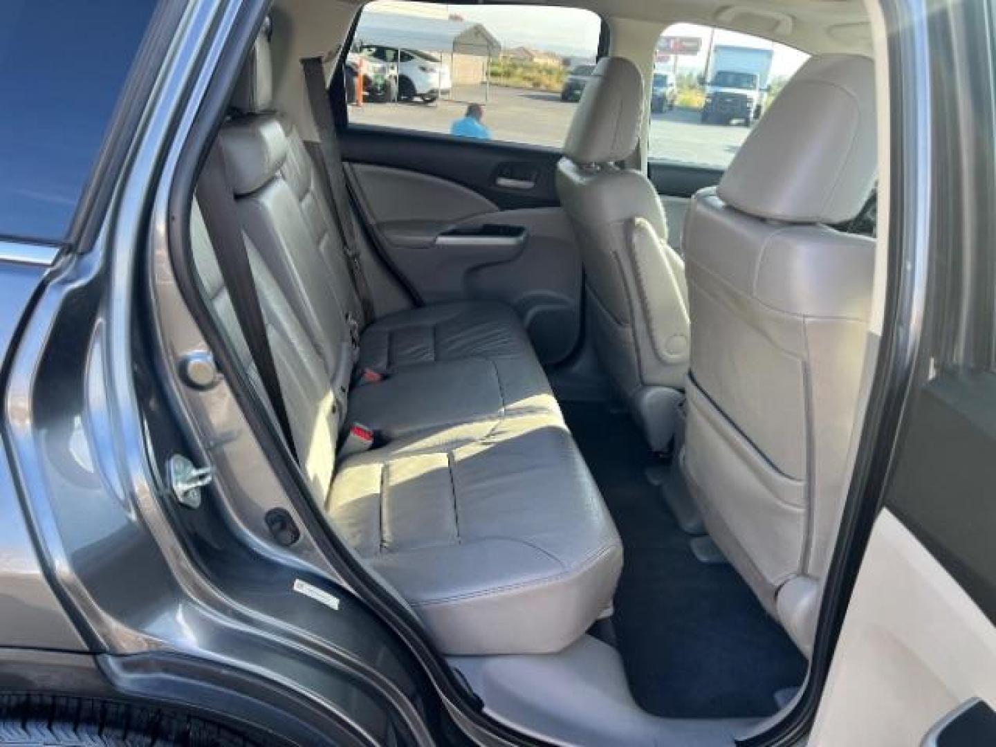 2013 Urban Titanium Metallic /Black Leather Interior Honda CR-V EX-L 4WD 5-Speed AT (2HKRM4H71DH) with an 2.4L L4 DOHC 16V engine, 5-Speed Automatic transmission, located at 940 North Main Street, Cedar City, UT, 84720, (435) 628-0023, 37.692936, -113.061897 - Photo#25
