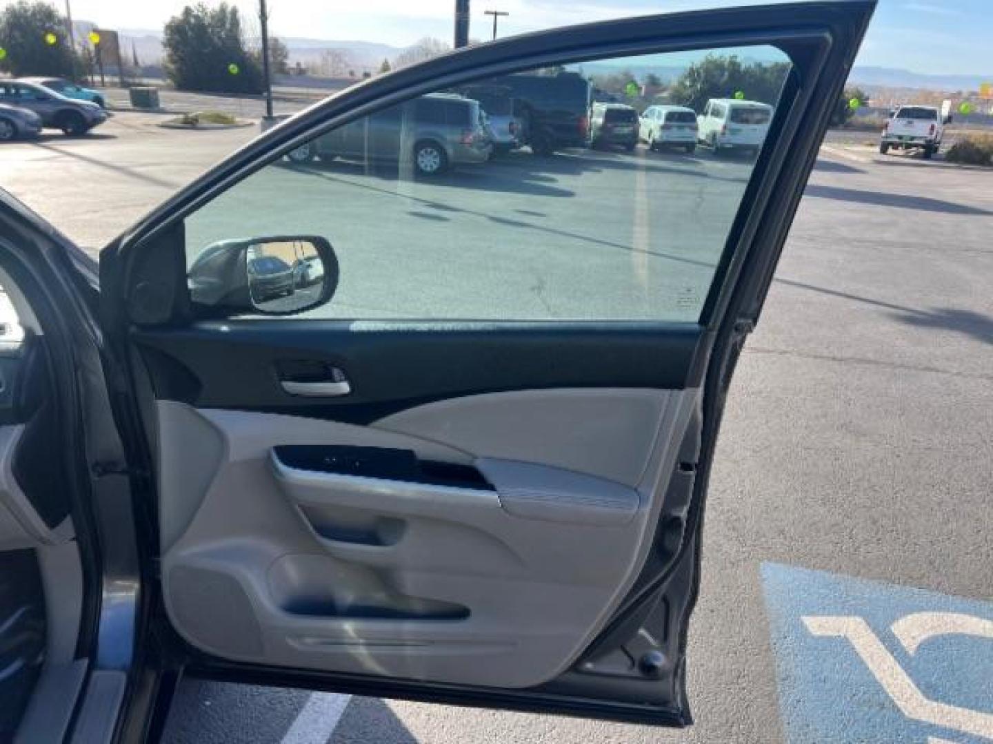 2013 Urban Titanium Metallic /Black Leather Interior Honda CR-V EX-L 4WD 5-Speed AT (2HKRM4H71DH) with an 2.4L L4 DOHC 16V engine, 5-Speed Automatic transmission, located at 940 North Main Street, Cedar City, UT, 84720, (435) 628-0023, 37.692936, -113.061897 - Photo#26